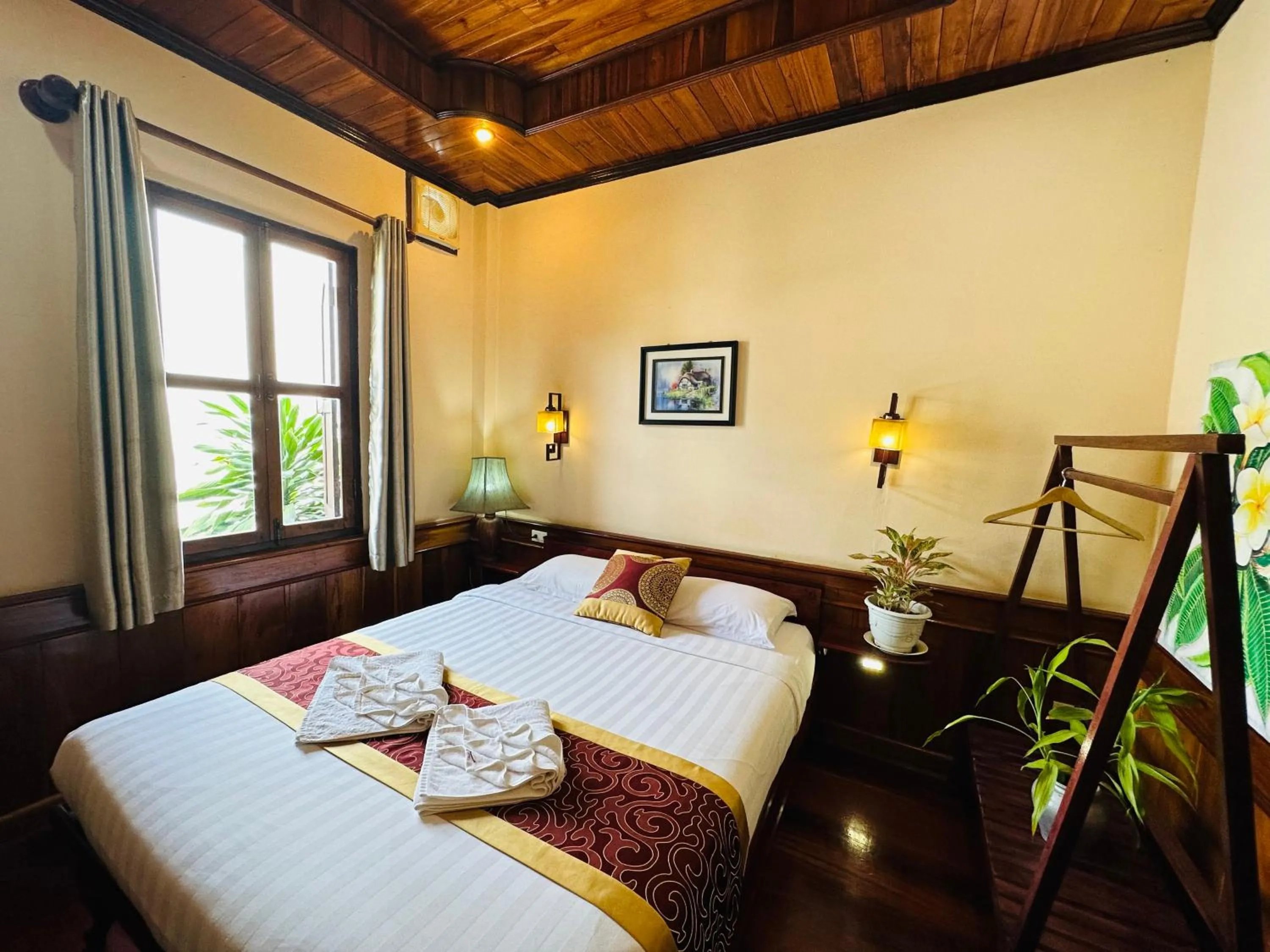 Bed in Ammata Boutique Villa