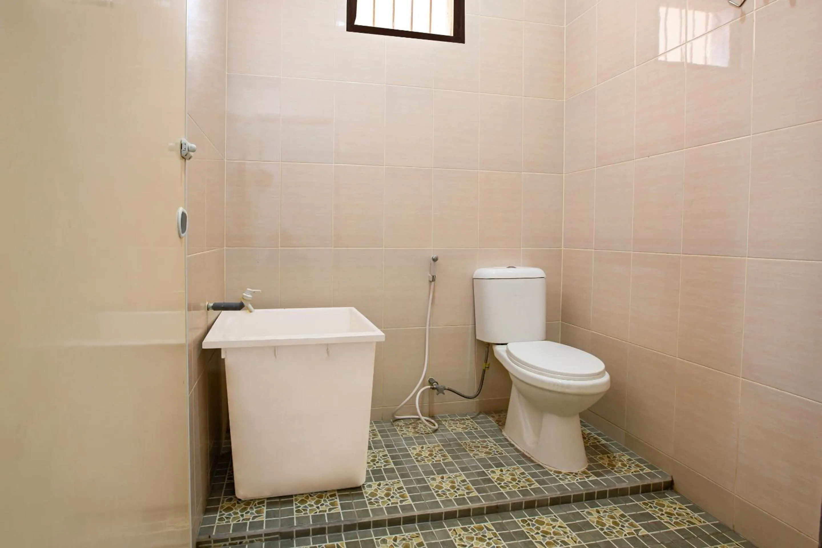 Bathroom in Hotel O Homestay Romauli Kampung Radja
