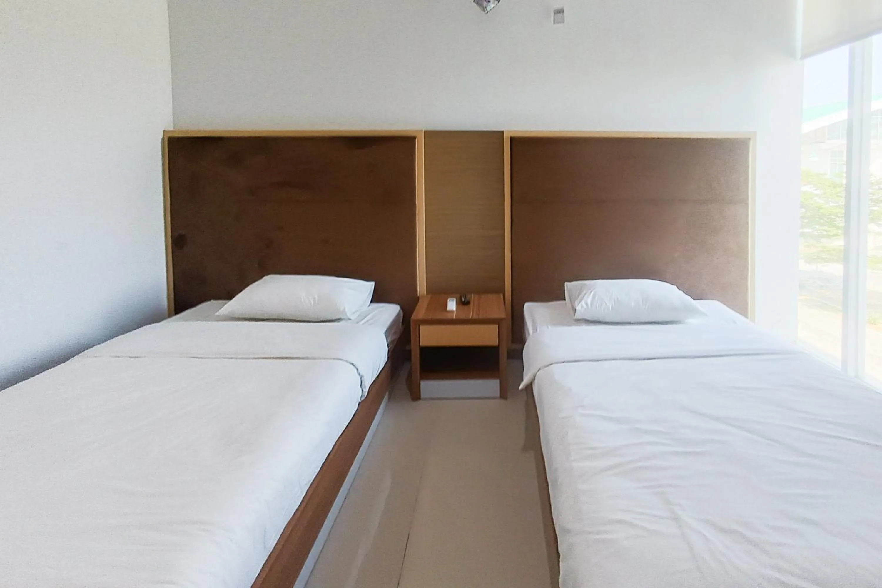 Bedroom, Bed in Urbanview Hotel Syariah UIN Mataram
