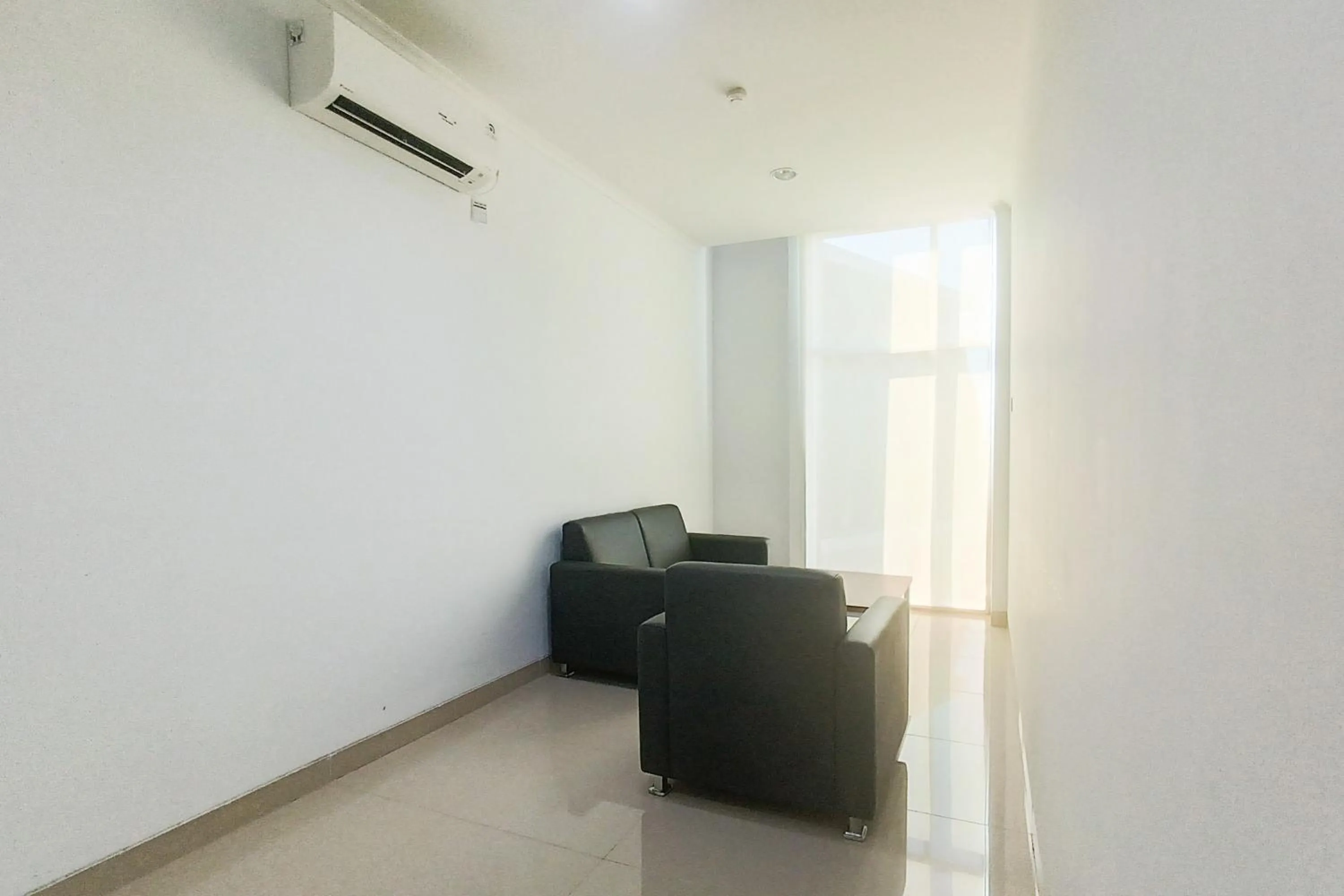 Seating area in Urbanview Hotel Syariah UIN Mataram