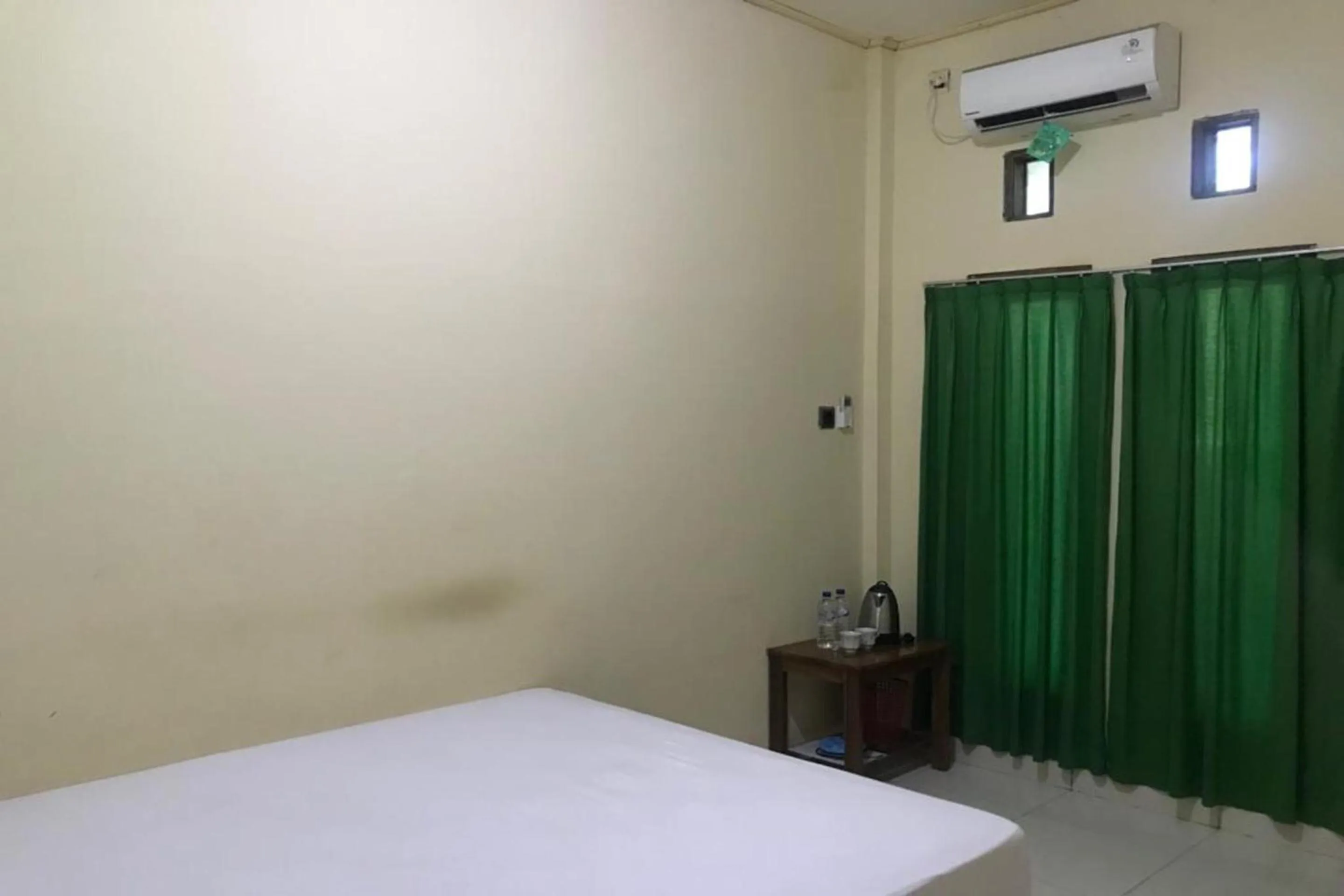 Bedroom in Hotel O Penginapan Mc Lodge