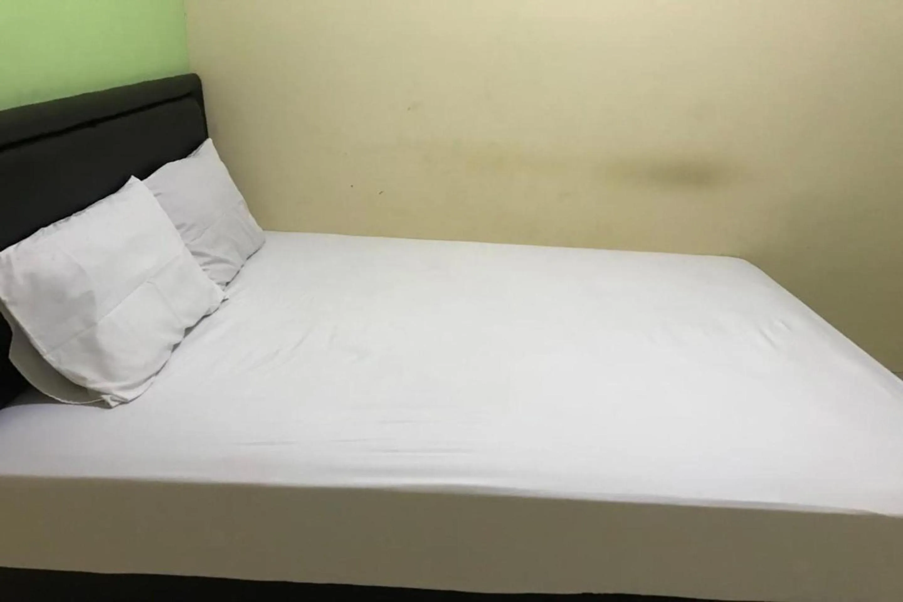 Bedroom in Hotel O Penginapan Mc Lodge