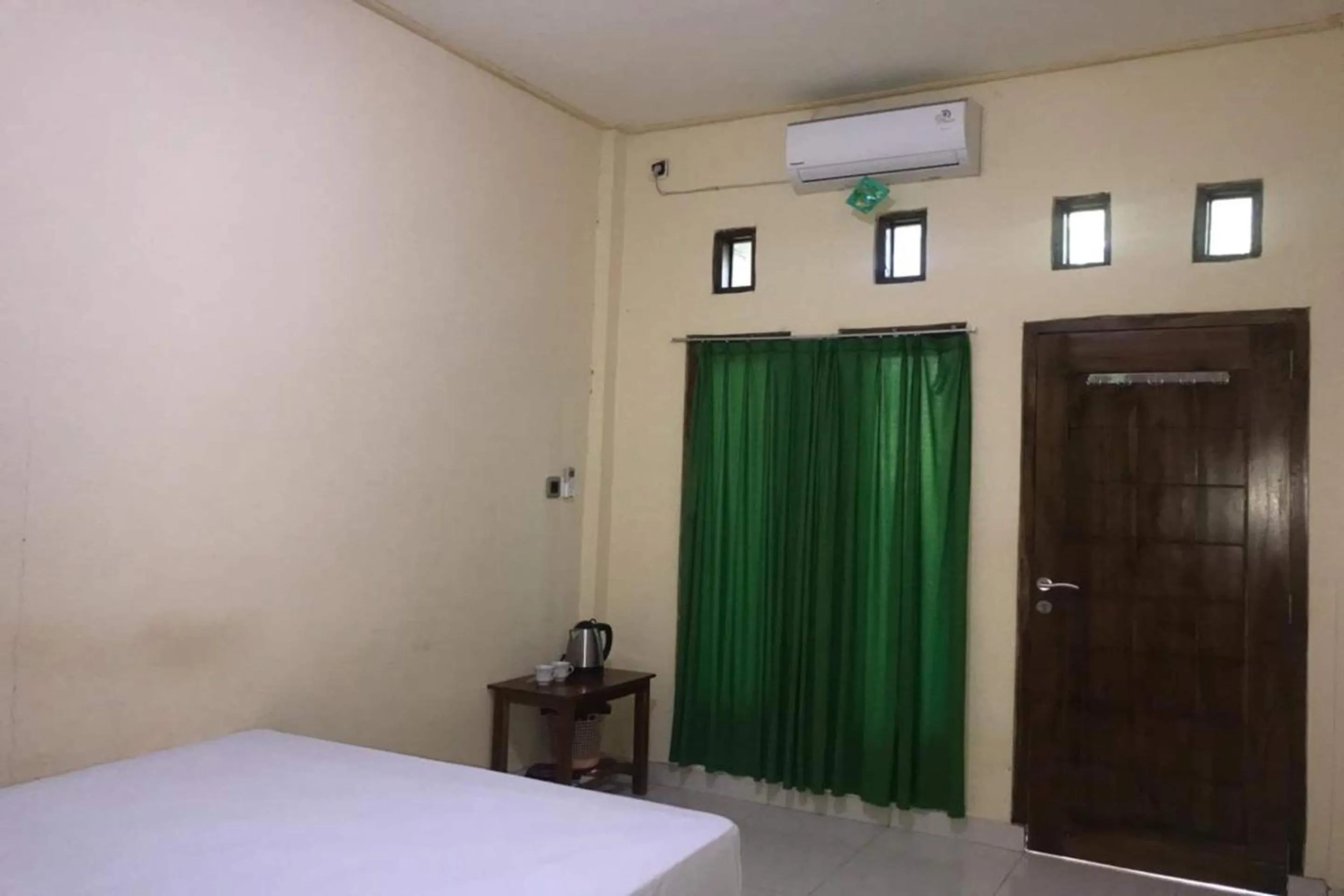 Bedroom in Hotel O Penginapan Mc Lodge