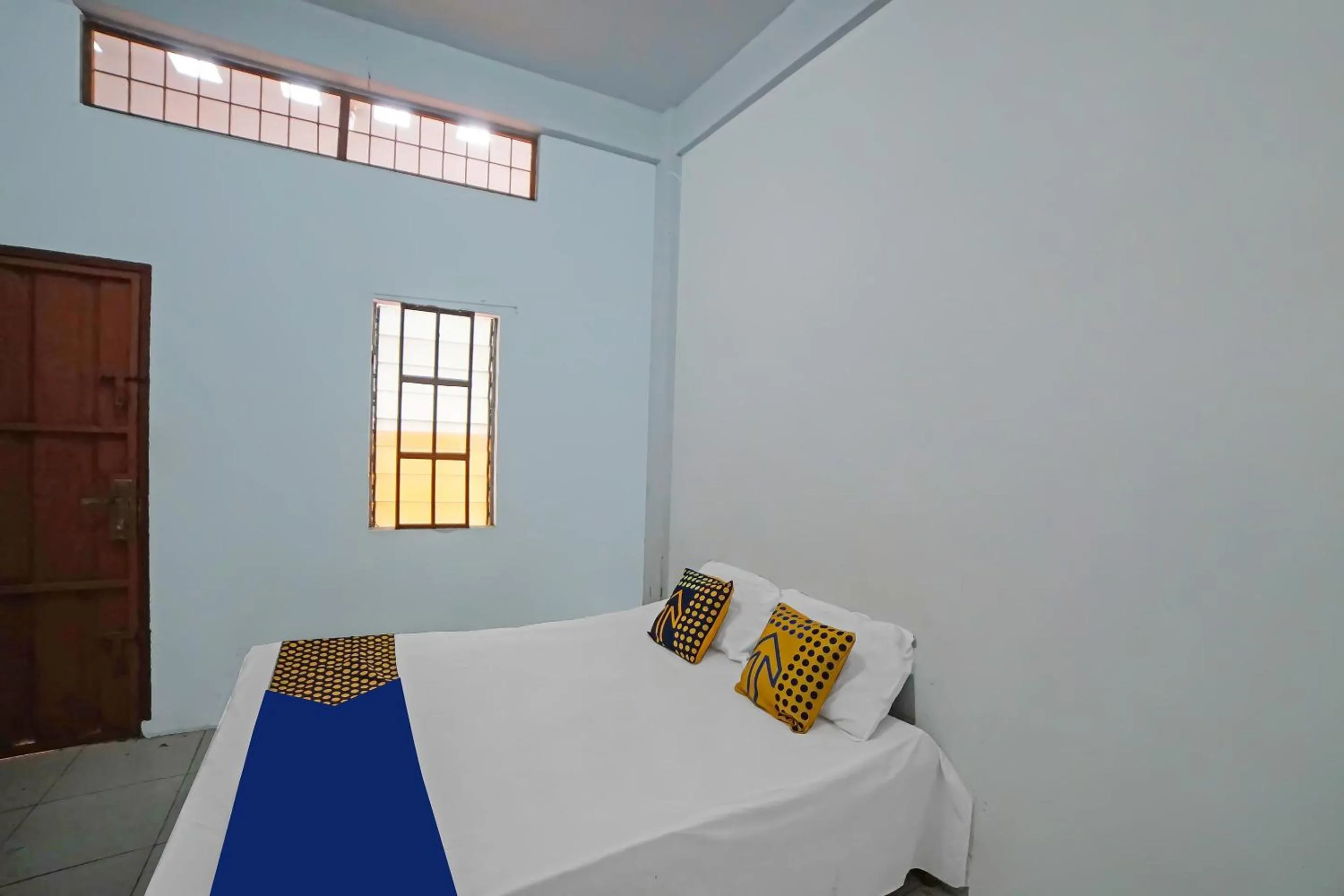 Bedroom in Hotel O Mandiri Inn