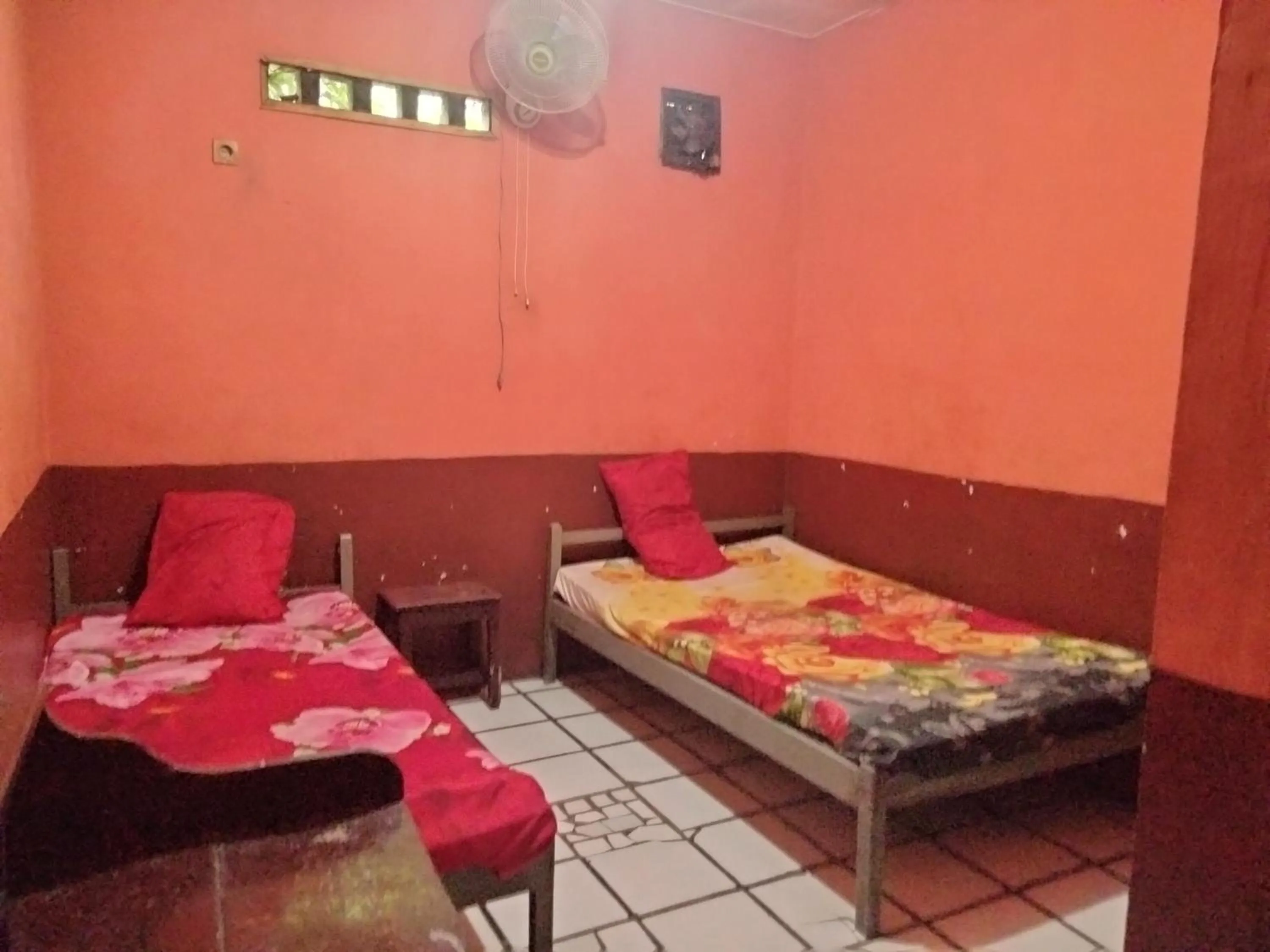 Bedroom, Bed in Hotel O Penginapan Keluarga