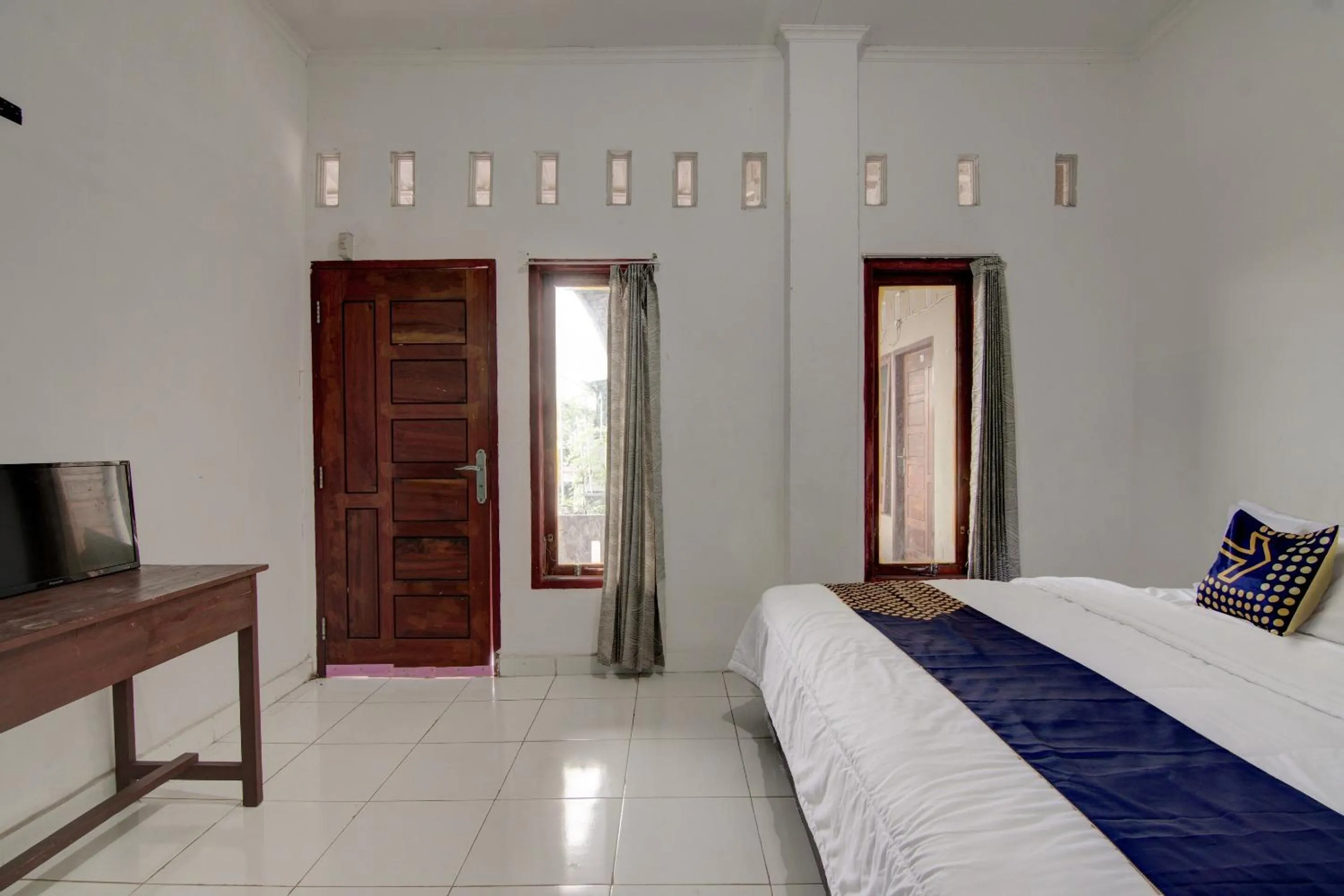 Bedroom, Bed in Hotel O Homestay Baiturrahmah Syariah