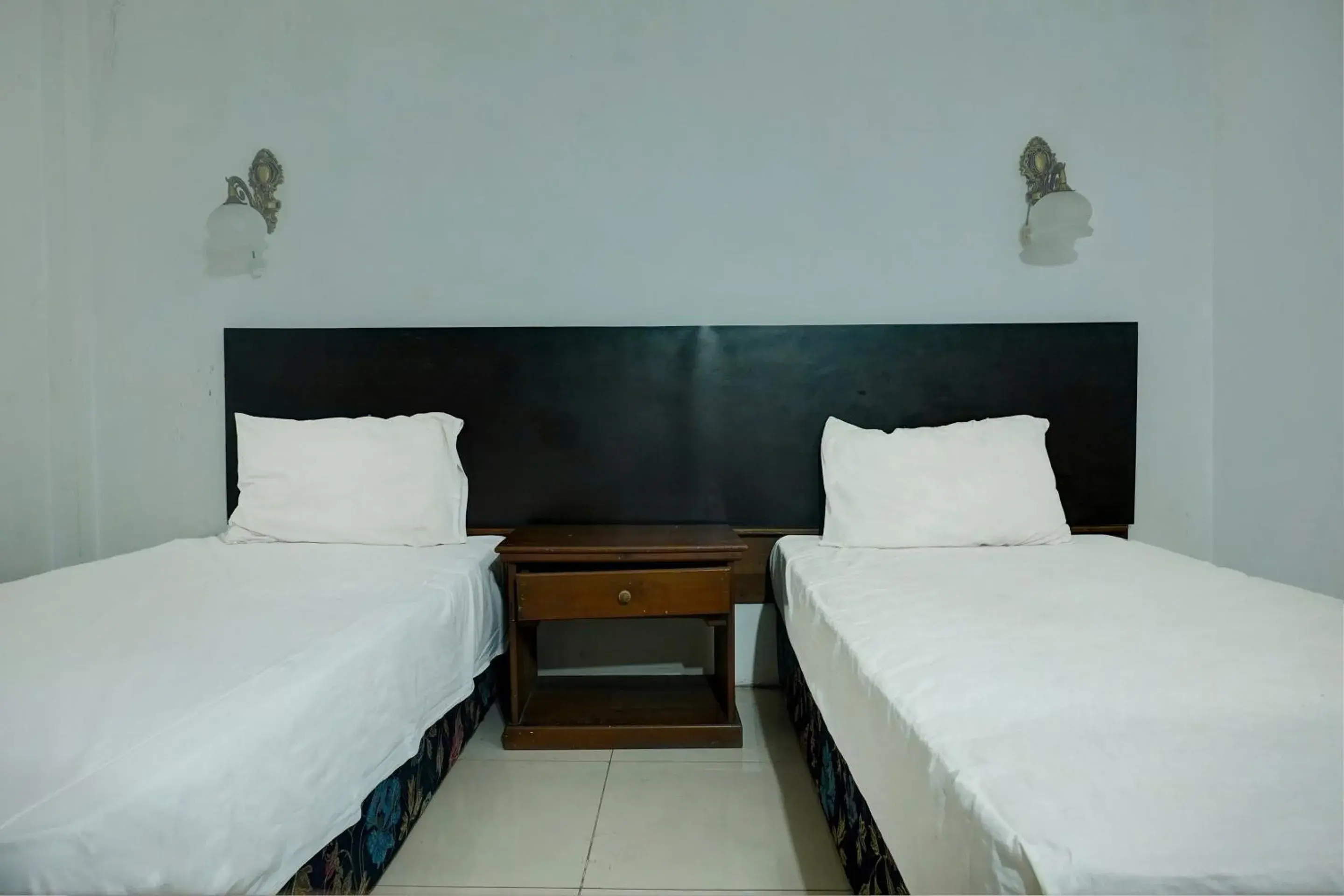 Standard Twin Room in Hotel O Ervina Homestay Syariah Batakan Standard Twin Room in Hotel O Ervina Homestay Syariah Batakan