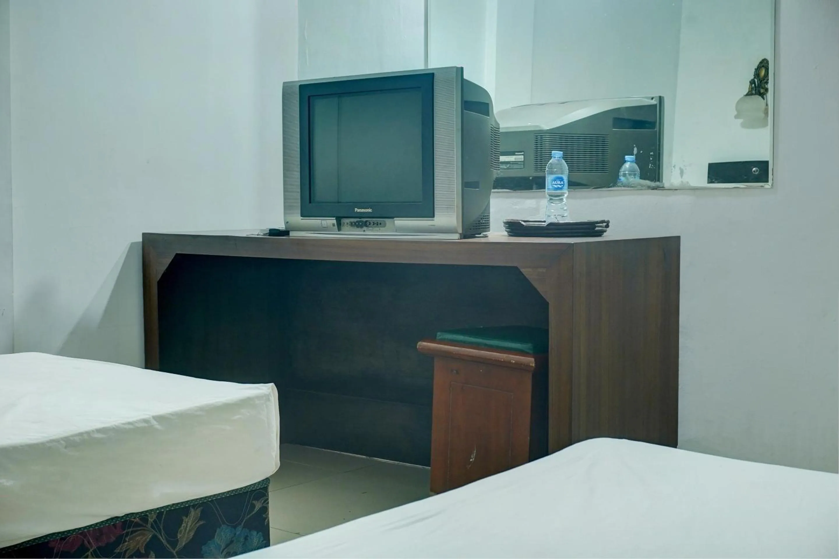 Bedroom in Hotel O Ervina Homestay Syariah Batakan