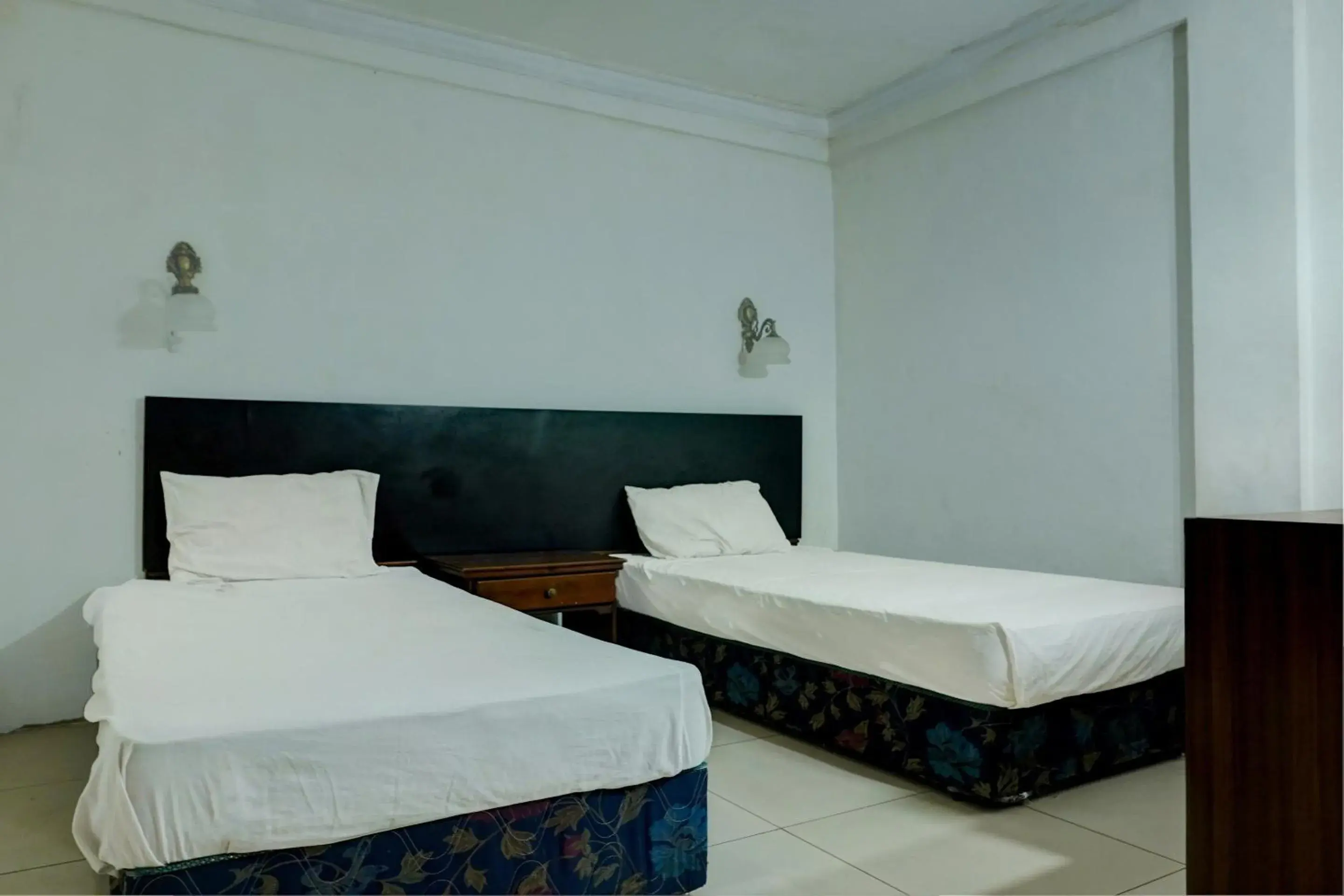 Standard Twin Room in Hotel O Ervina Homestay Syariah Batakan Standard Twin Room in Hotel O Ervina Homestay Syariah Batakan