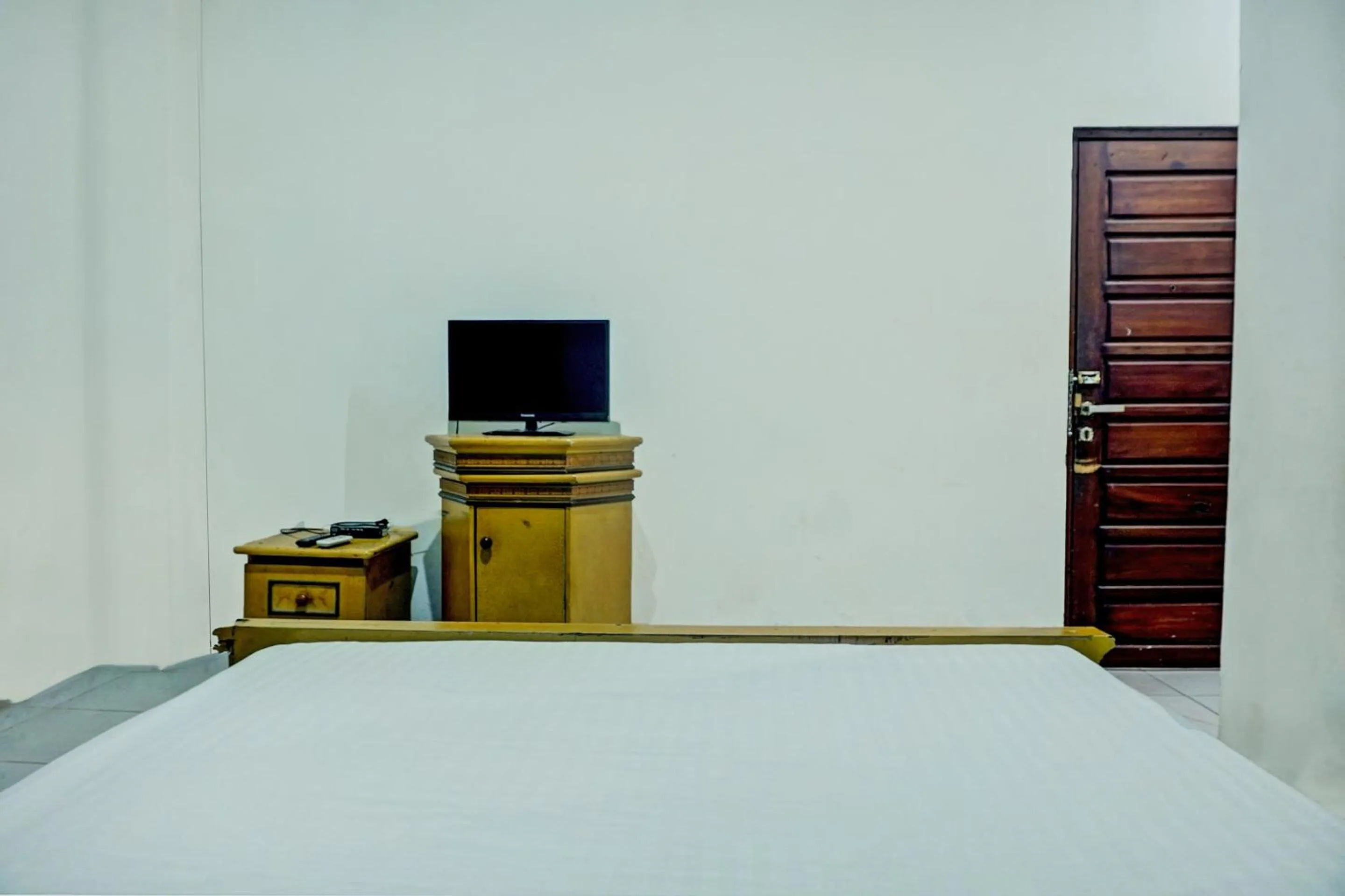 Bedroom in Hotel O Ervina Homestay Syariah Batakan