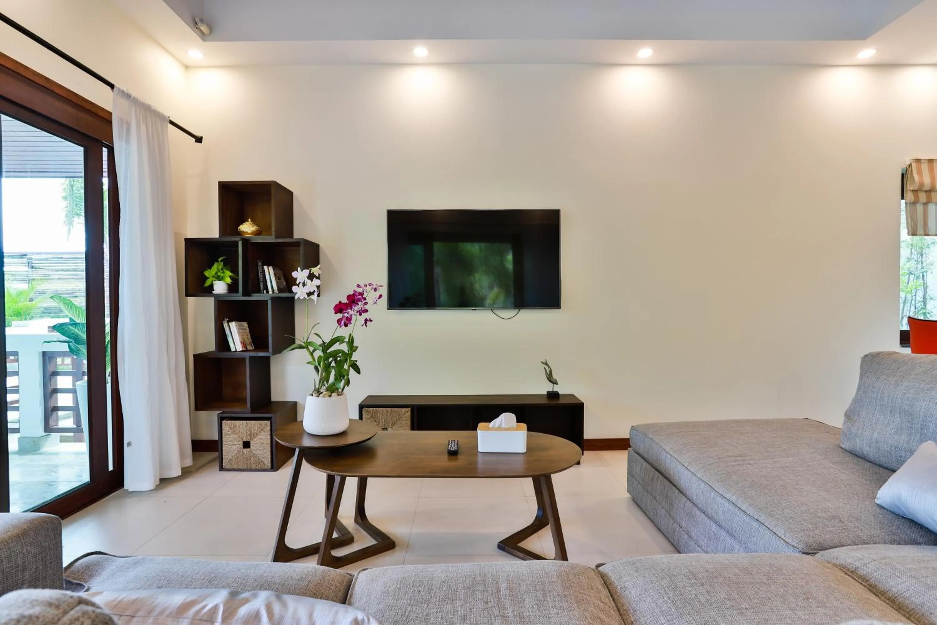 Communal lounge/ TV room in Cliff Haven Villa Krabi