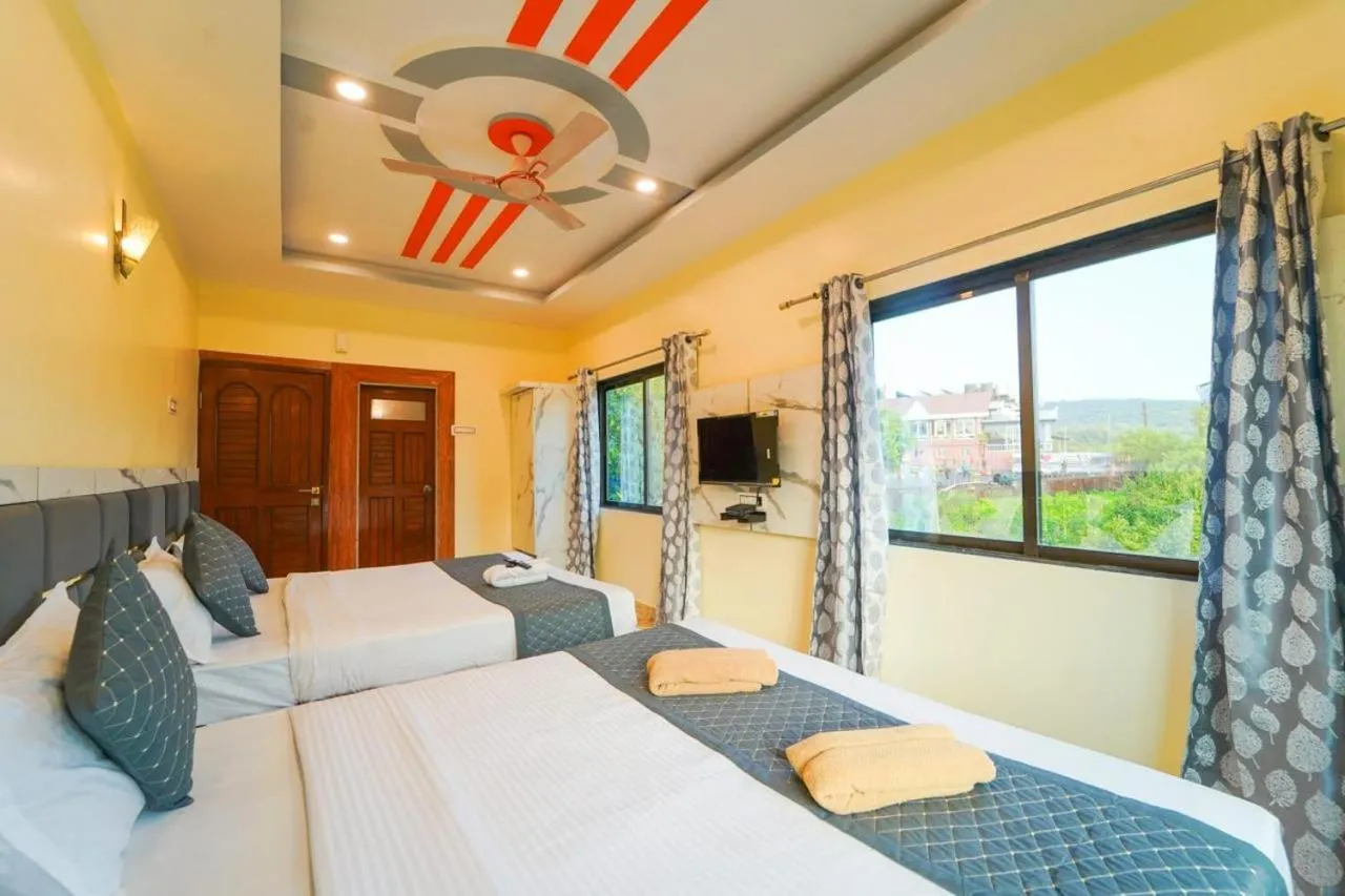 Bed in Saanjh Riverside Resort