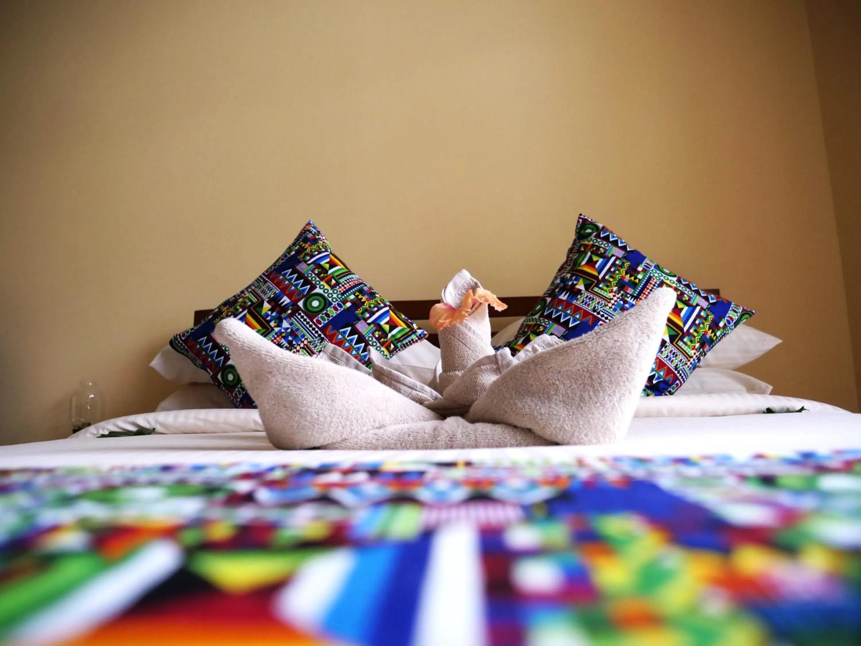 Bed in Double A Nungwi Beach Hotel