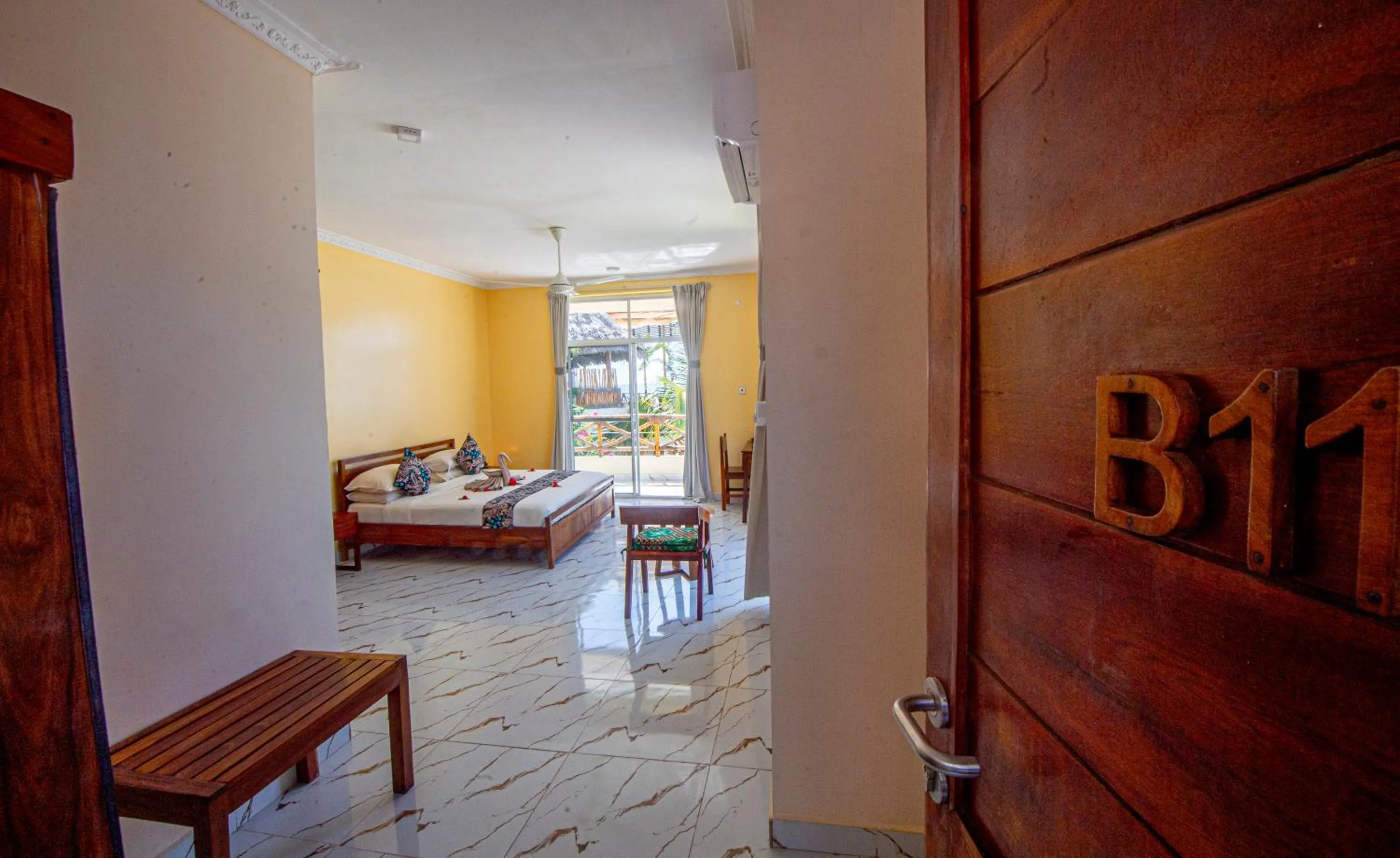 Bed in Double A Nungwi Beach Hotel