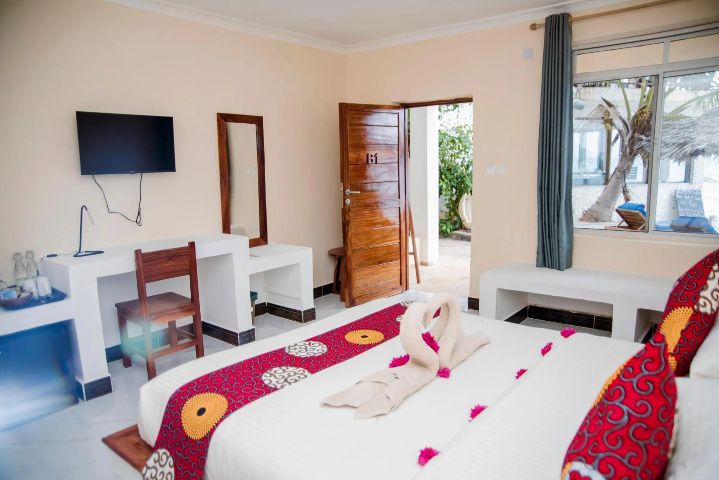 Bed in Double A Nungwi Beach Hotel