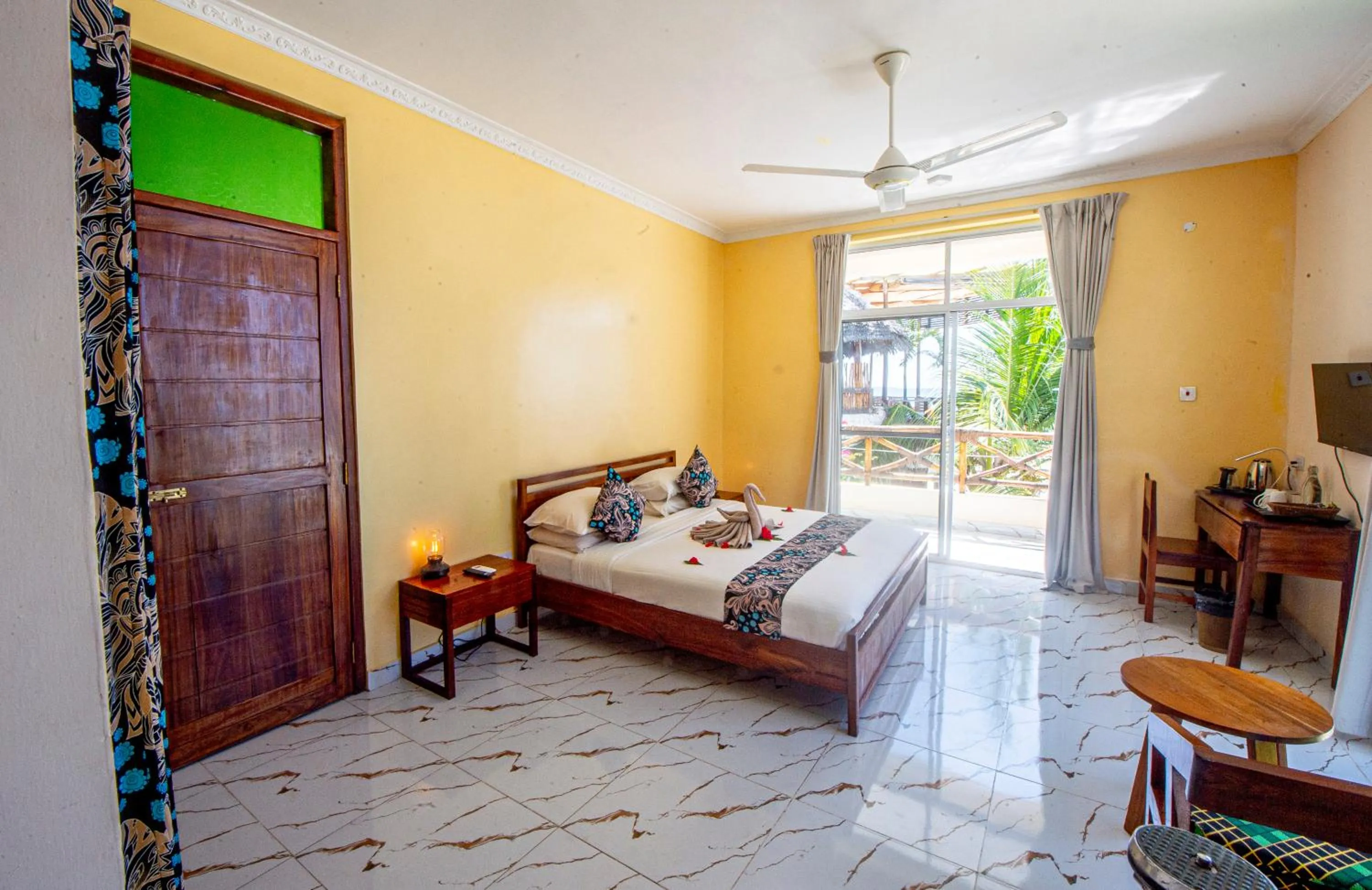 Bed in Double A Nungwi Beach Hotel