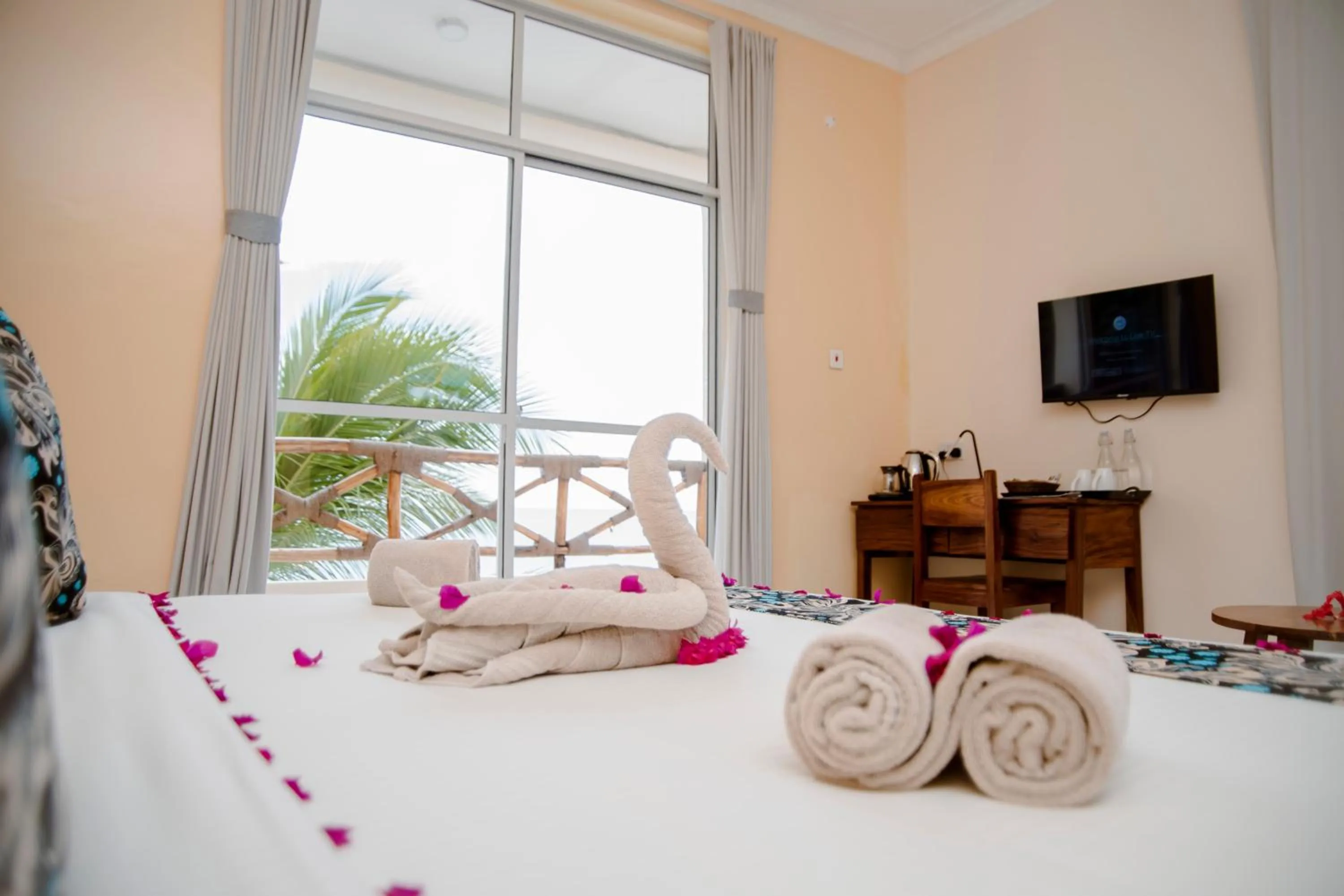 Bed in Double A Nungwi Beach Hotel