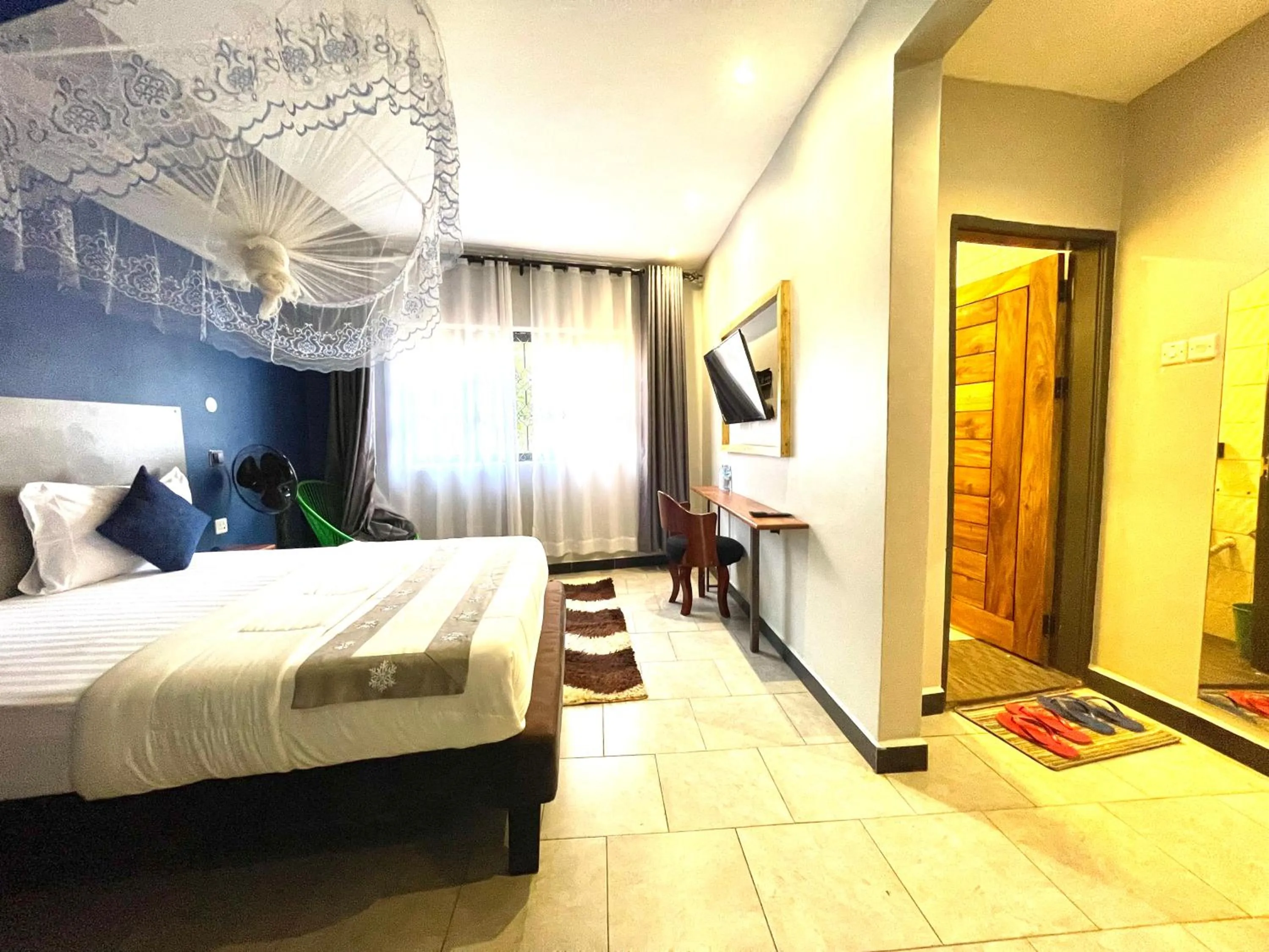 Bed in Ashleys Hotel