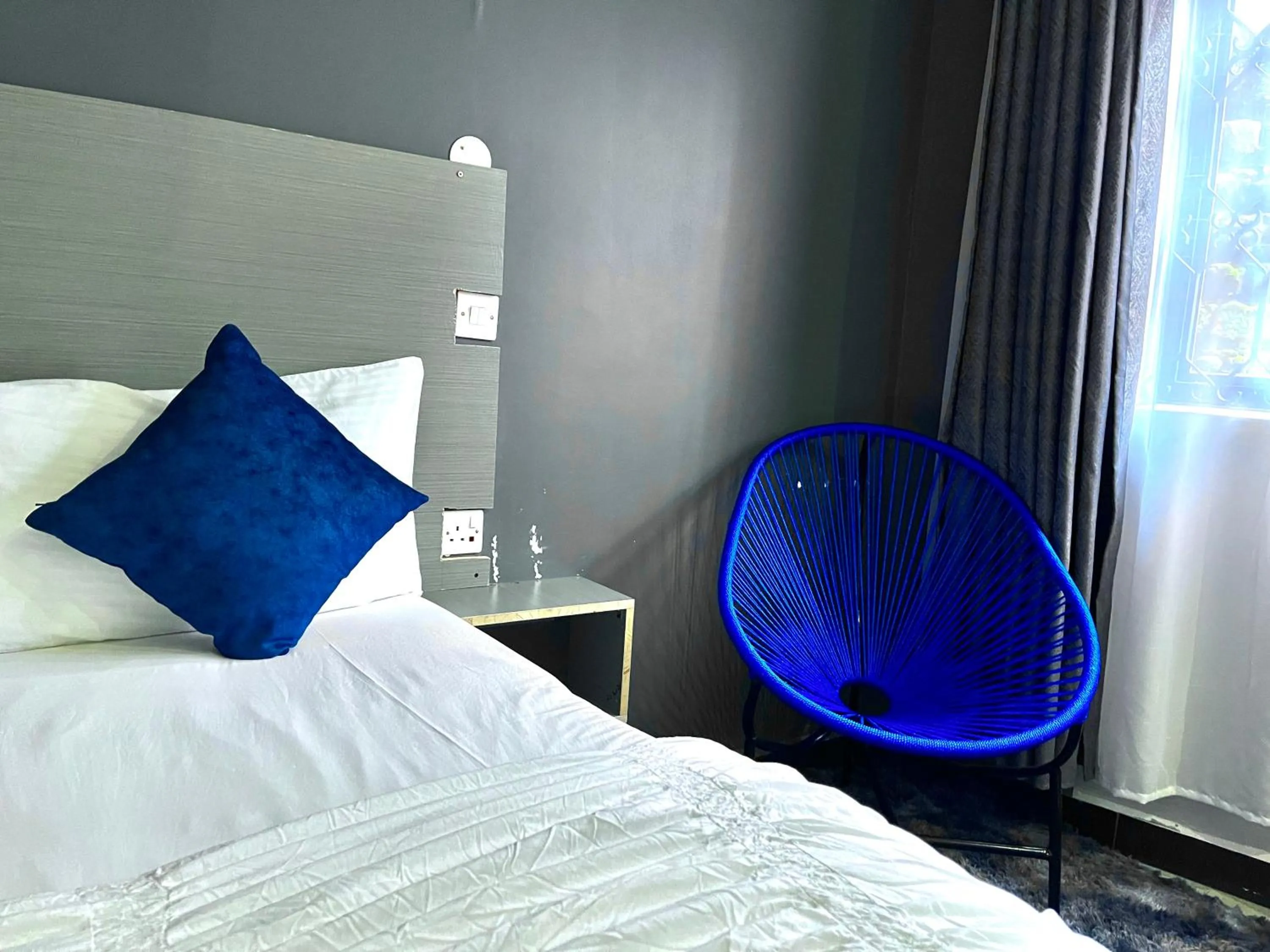 Bed in Ashleys Hotel