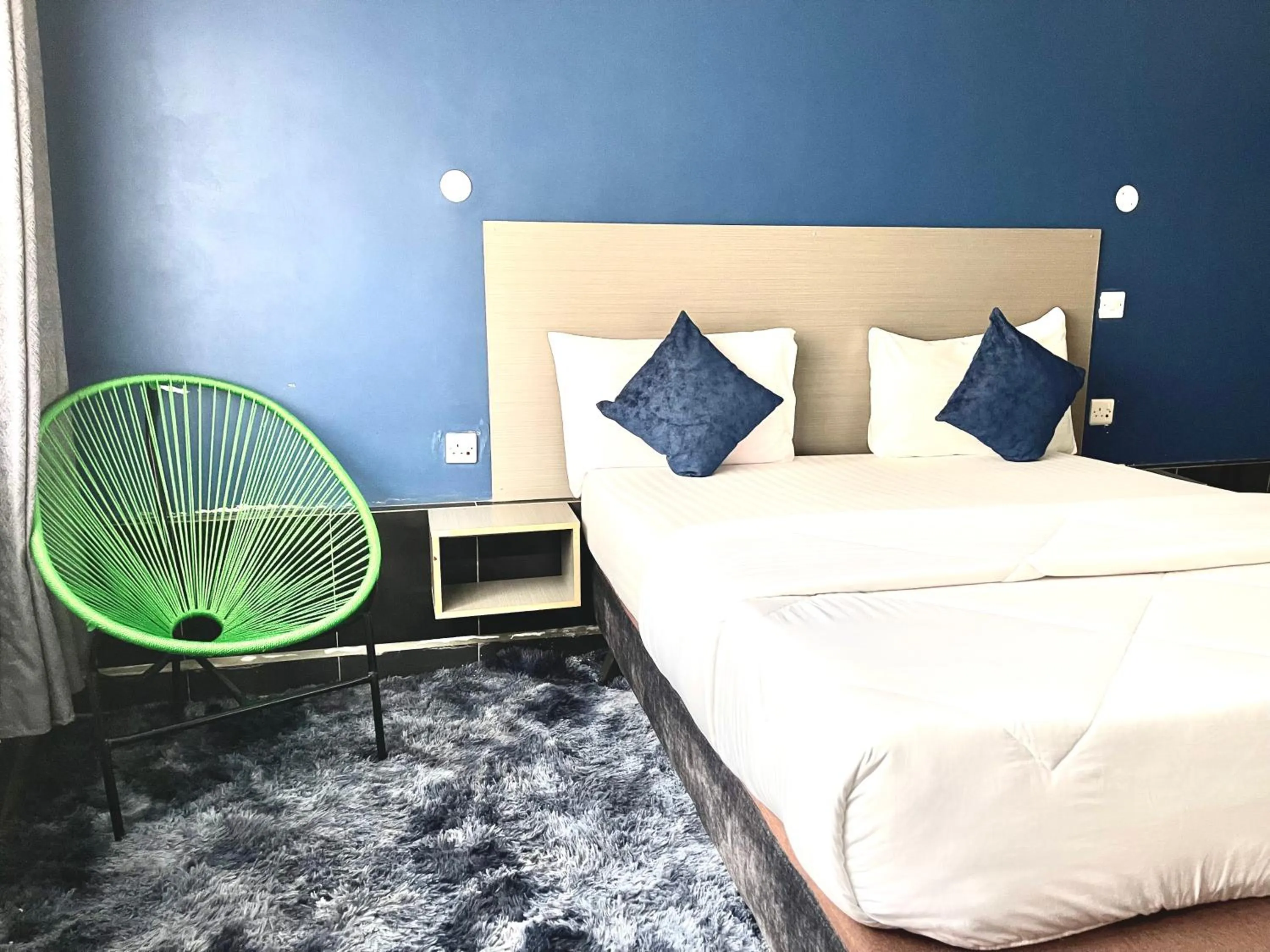 Bed in Ashleys Hotel