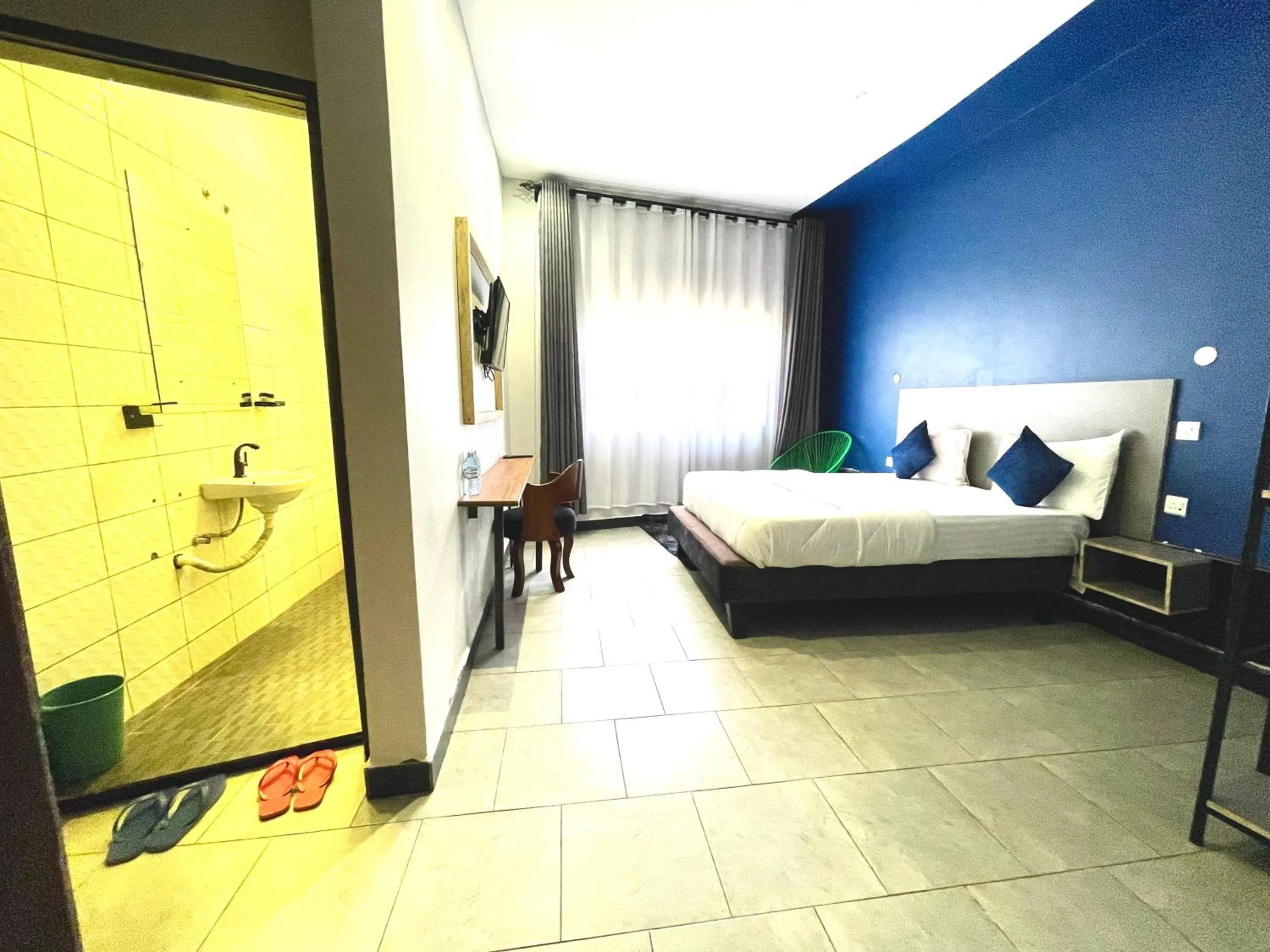 Bed in Ashleys Hotel