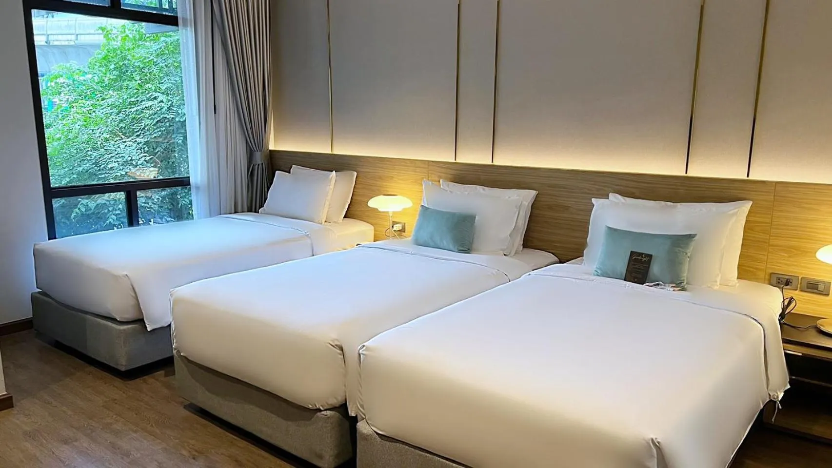 Photo of the whole room, Bed in SAM E Hotel Bangkok Sathorn