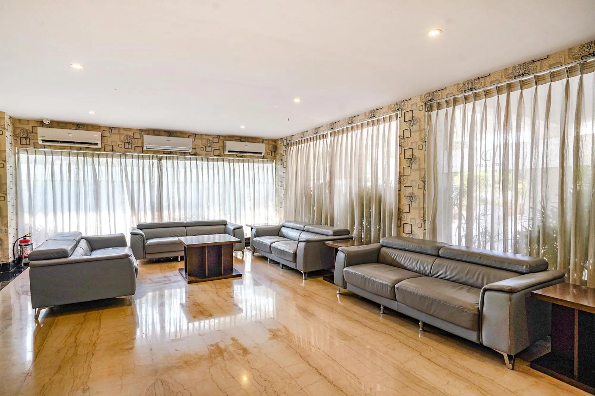 Seating area in FabHotel Prime D Dev - Nr Vijayawada Club