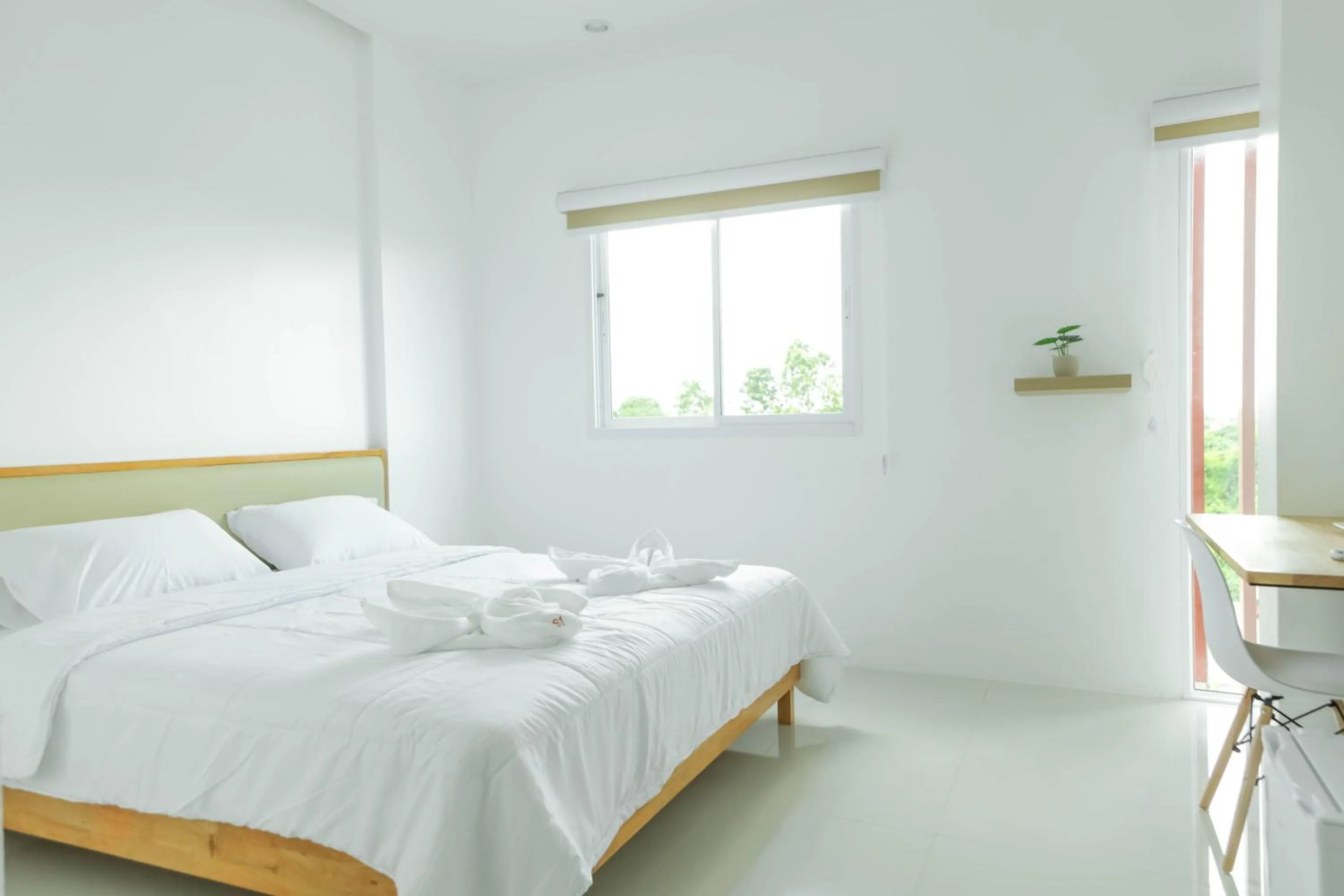 Photo of the whole room, Bed in S1 Trang Hotel