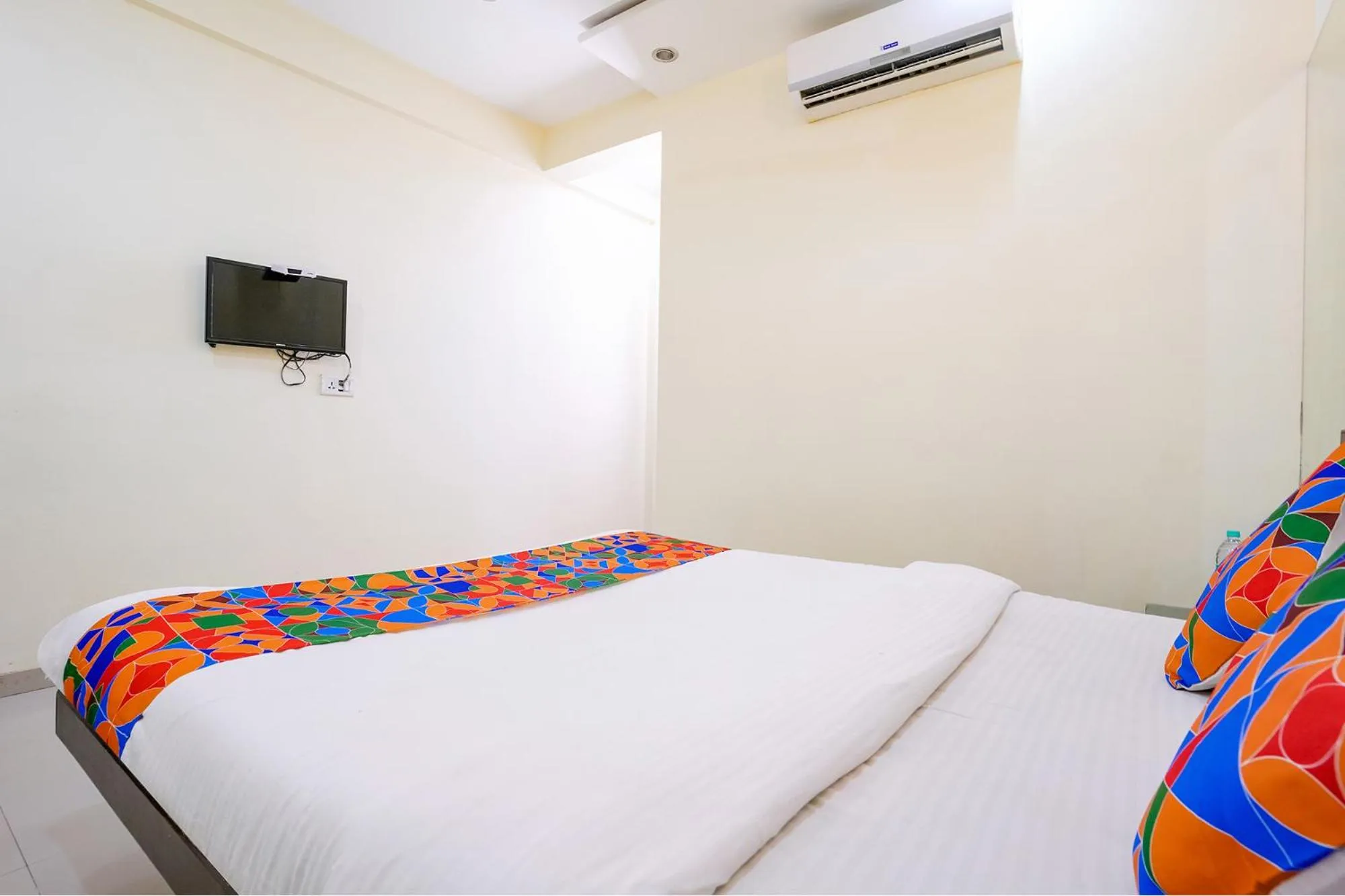 Communal lounge/ TV room, Bed in FabHotel Sai Govind