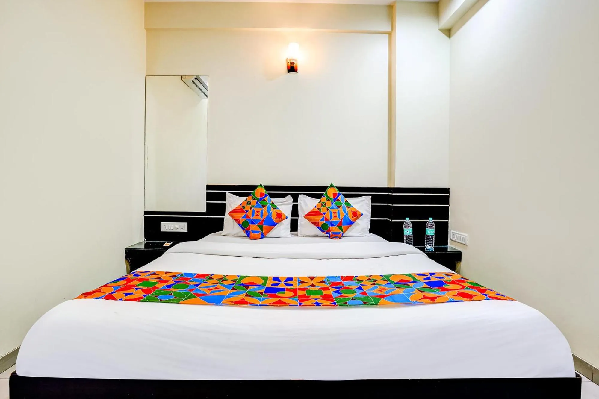 Bed in FabHotel Sai Govind