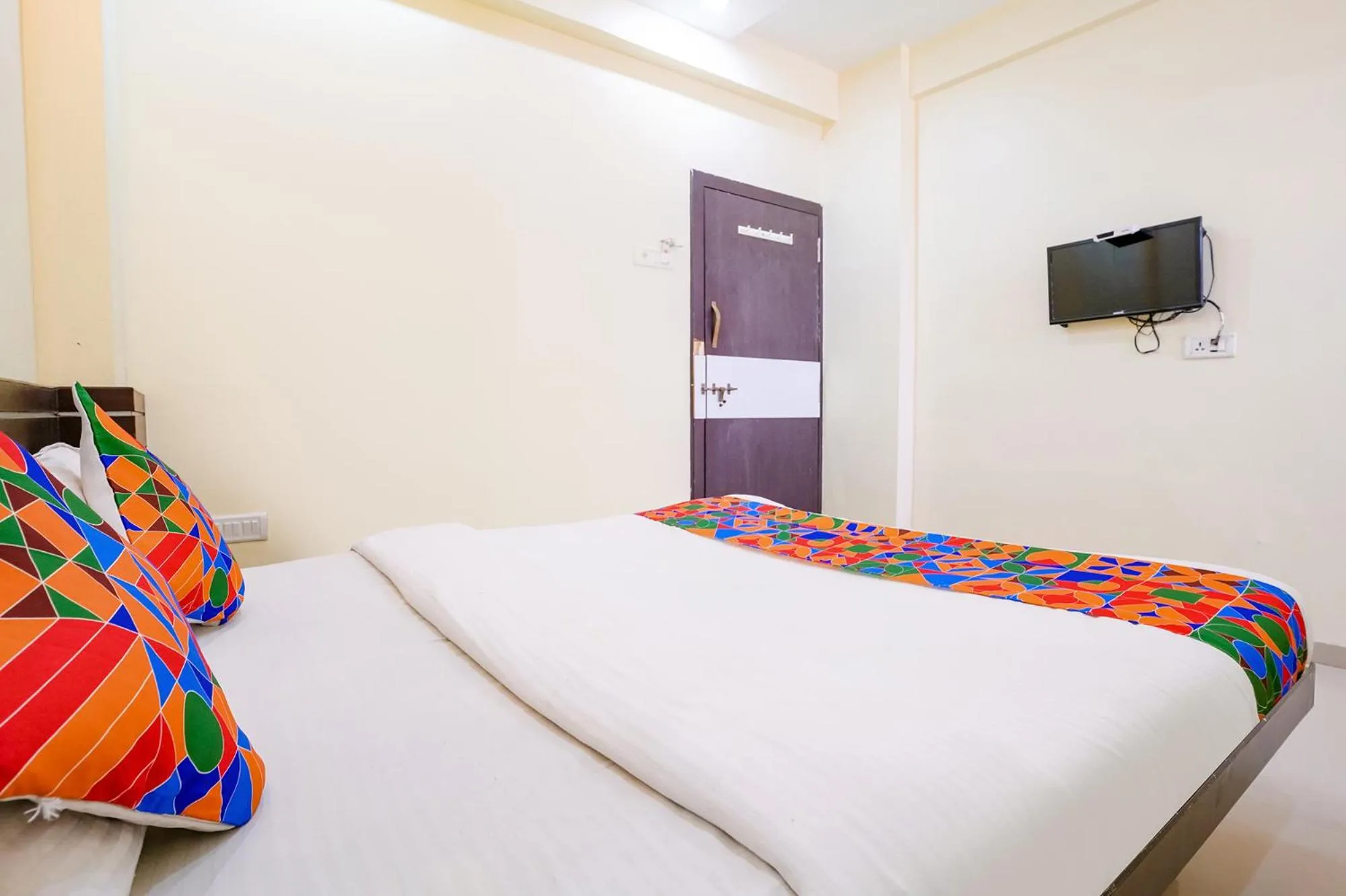 Communal lounge/ TV room, Bed in FabHotel Sai Govind