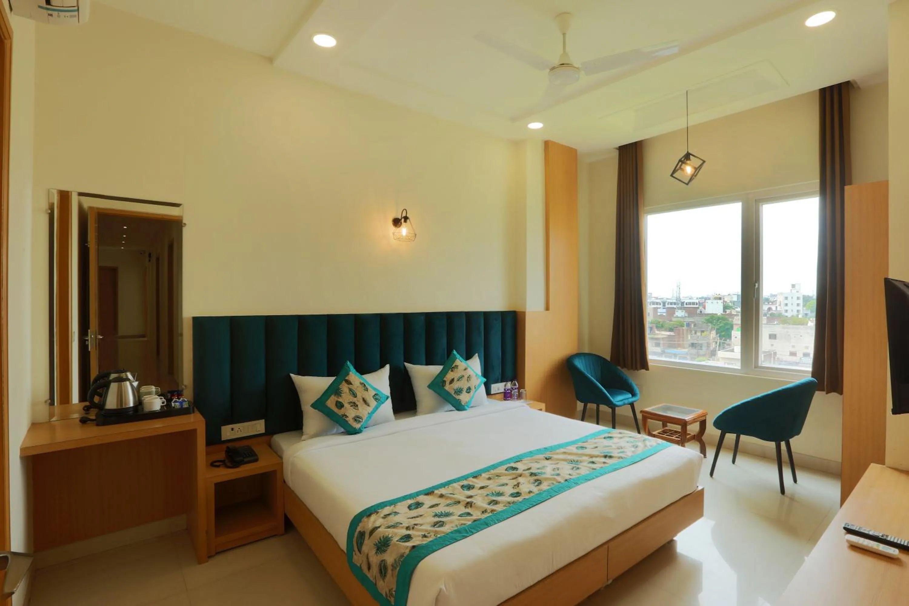 Bed in Regalia Grand By Delight Stay