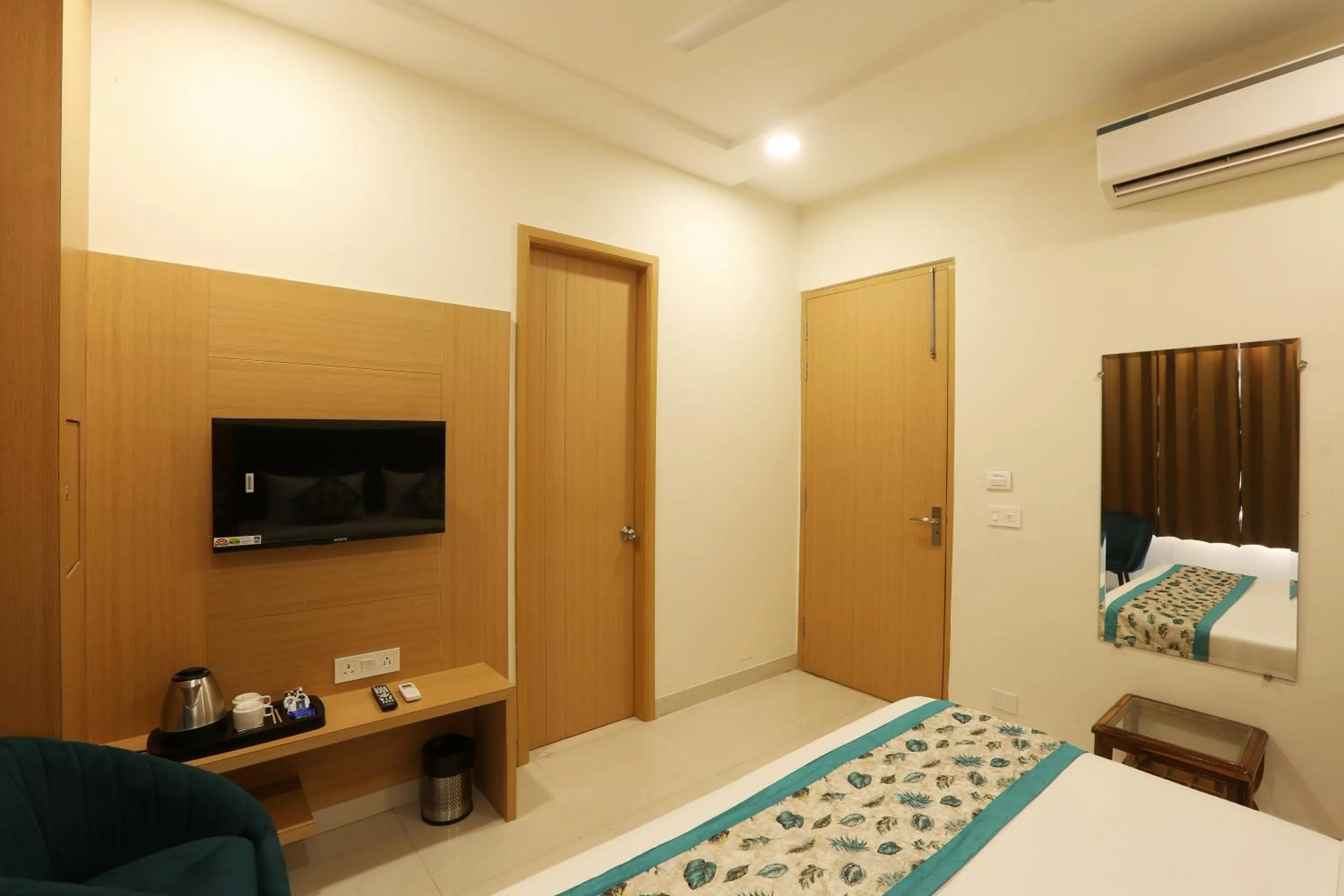 Photo of the whole room, Bed in Regalia Grand By Delight Stay