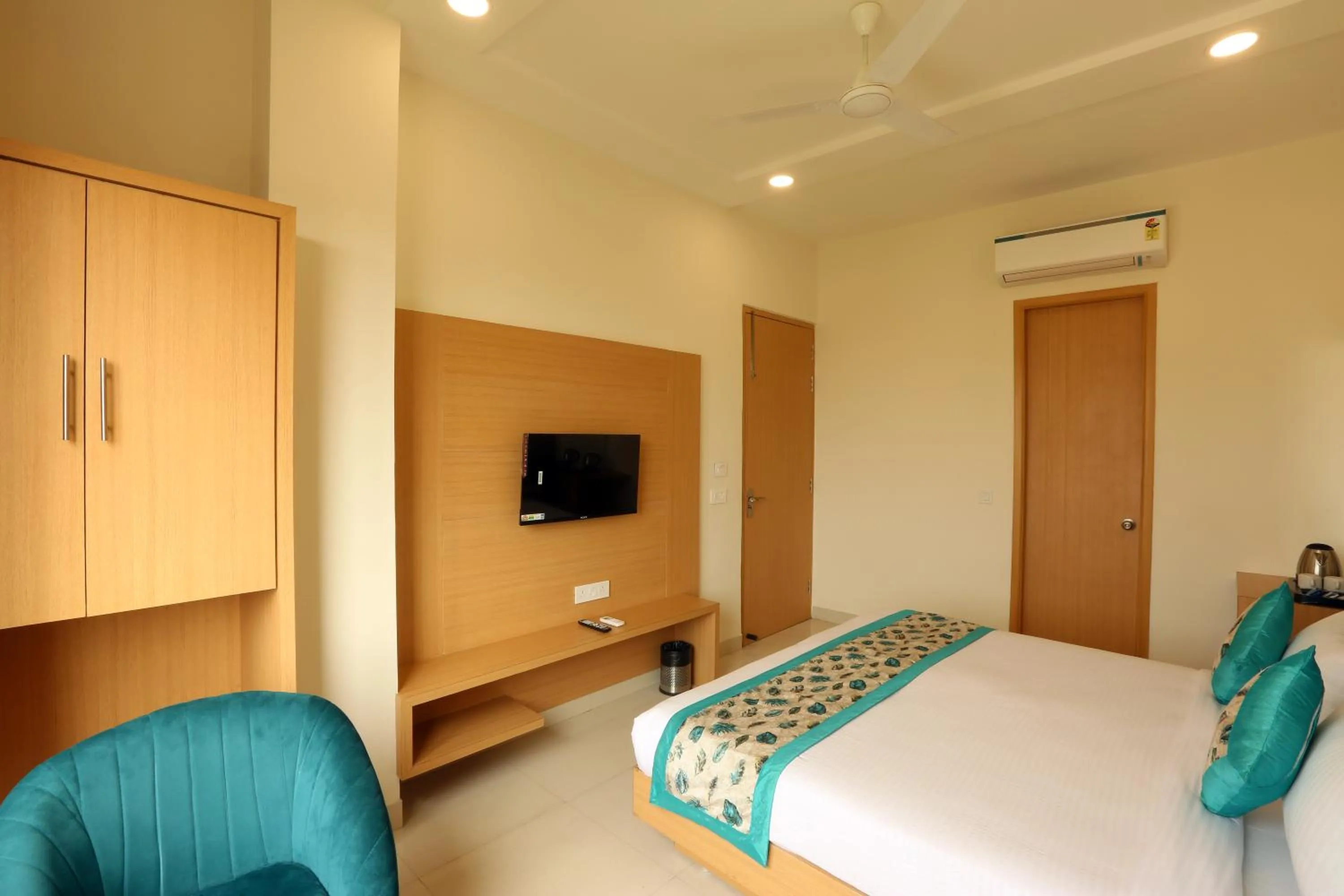 Bed in Regalia Grand By Delight Stay