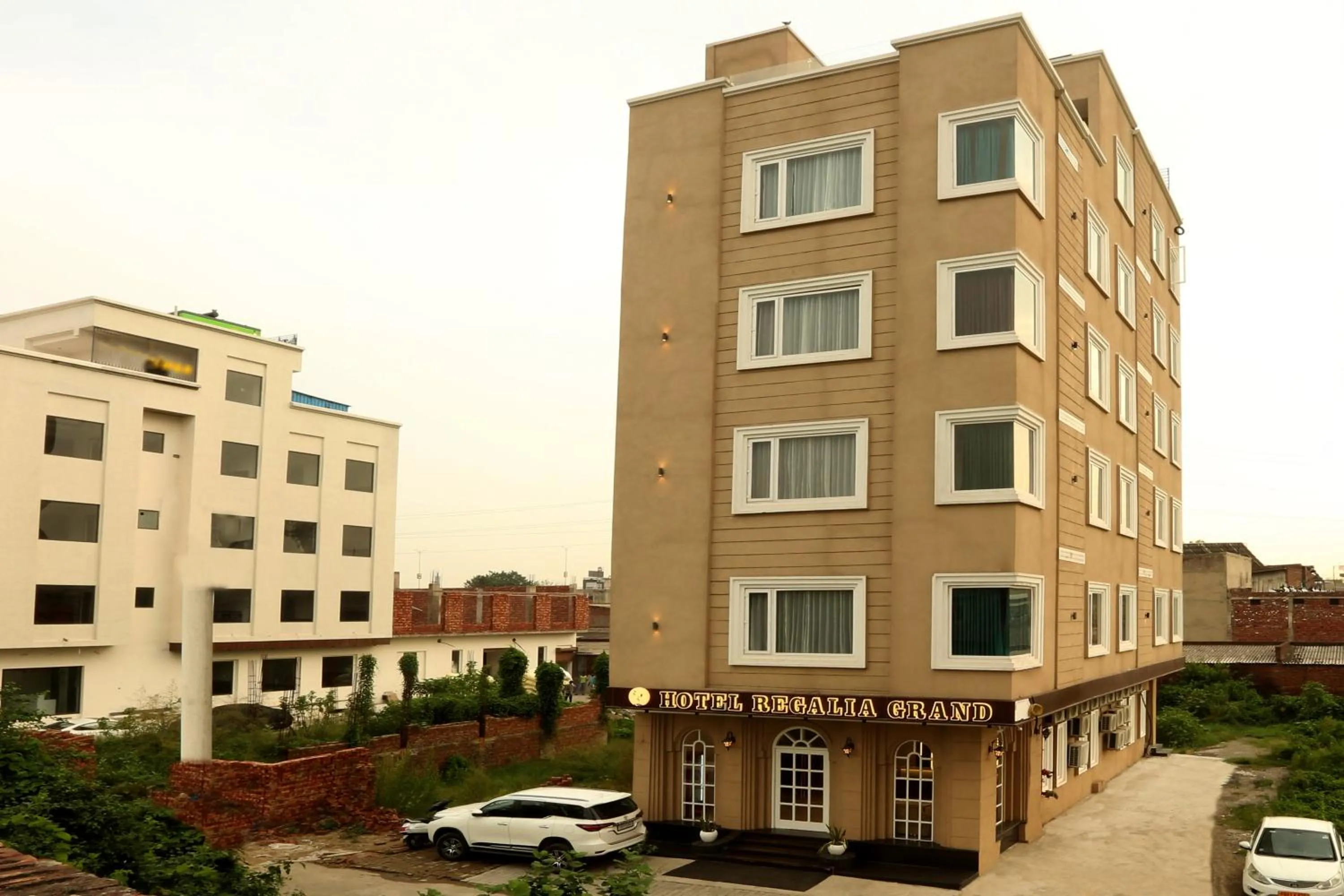 Property building in Regalia Grand By Delight Stay