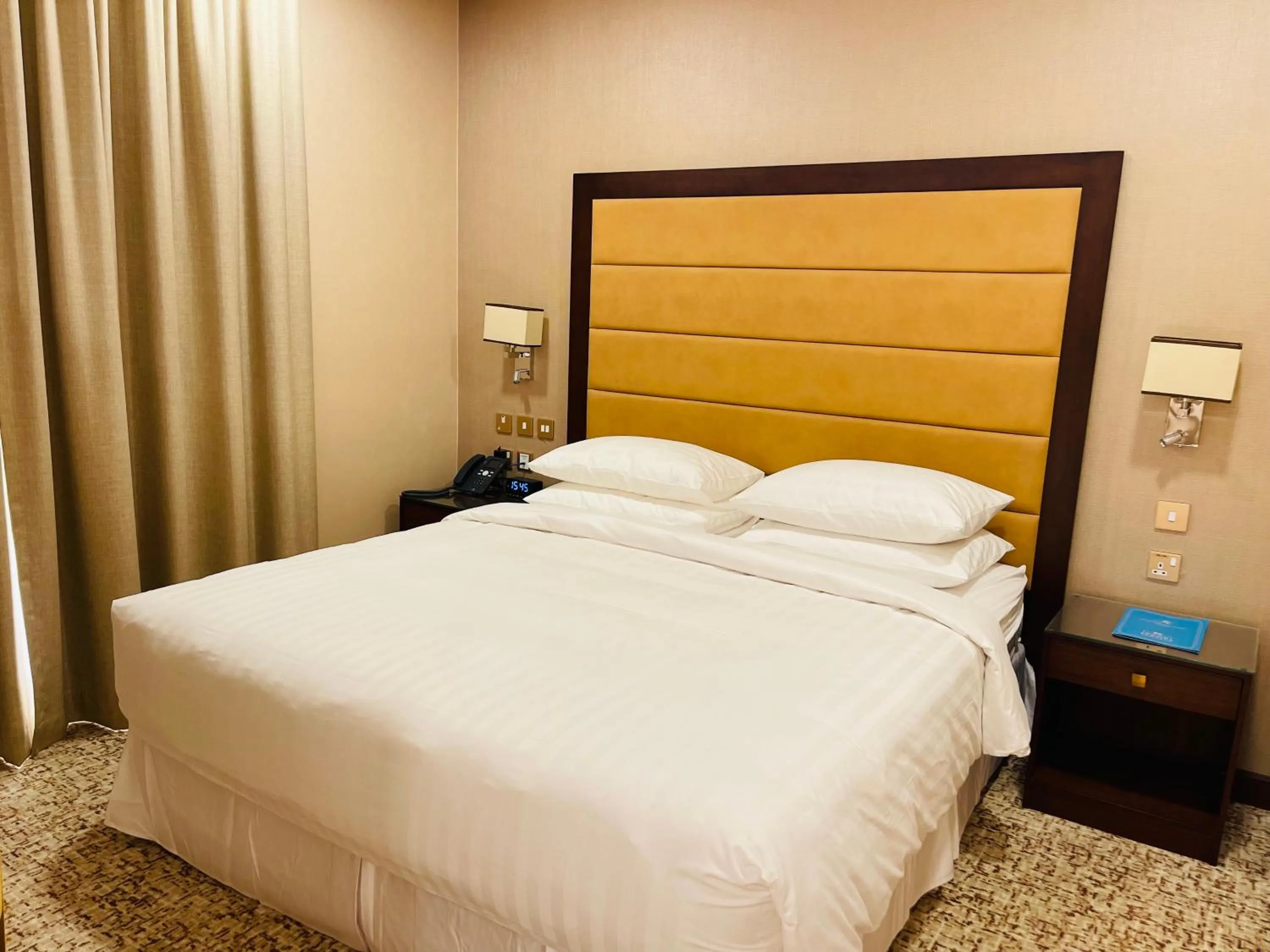 Bed in Grand Legacy Hotel Doha