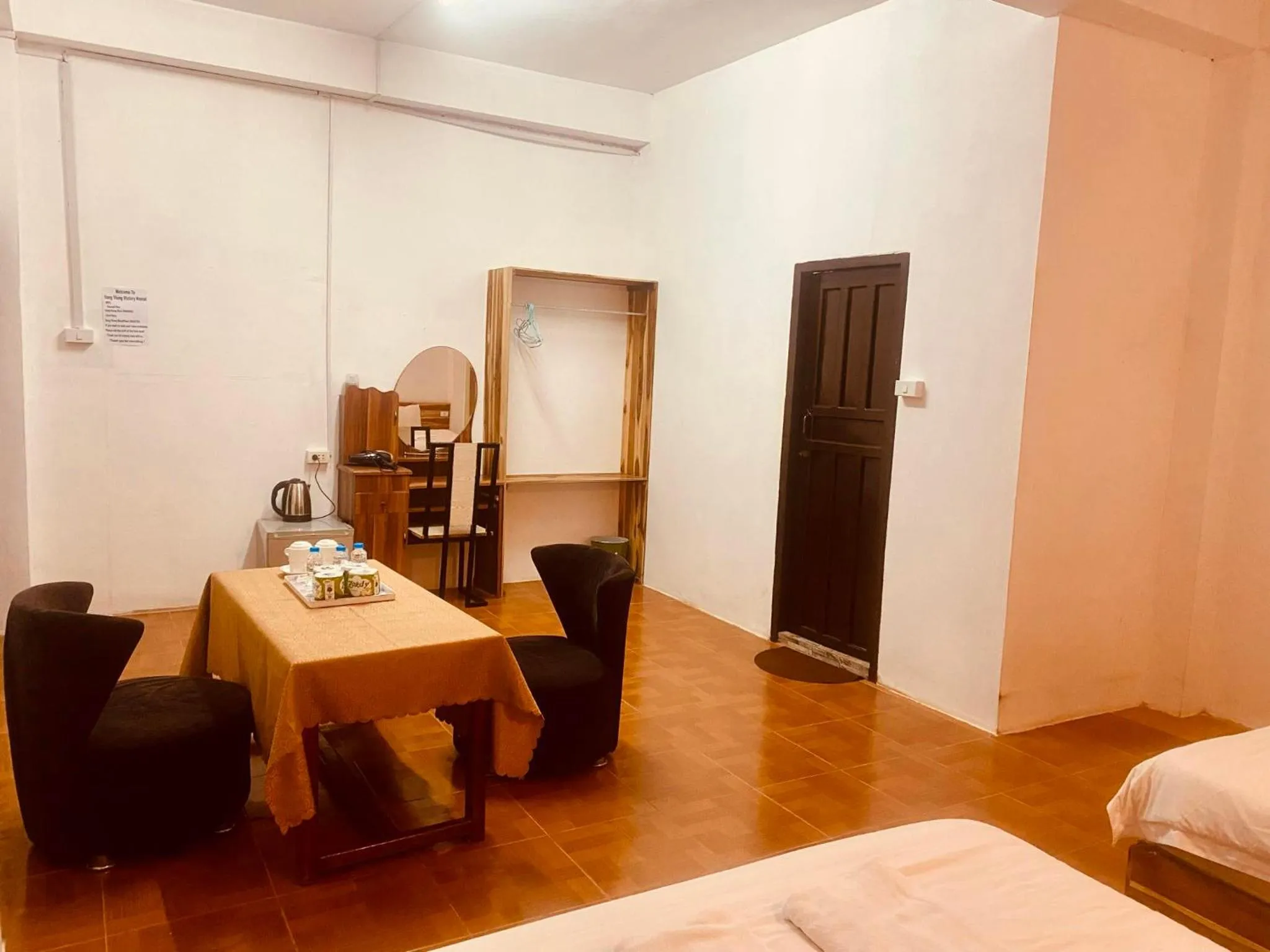 Seating area, Bed in Vang Vieng Victory Hostel