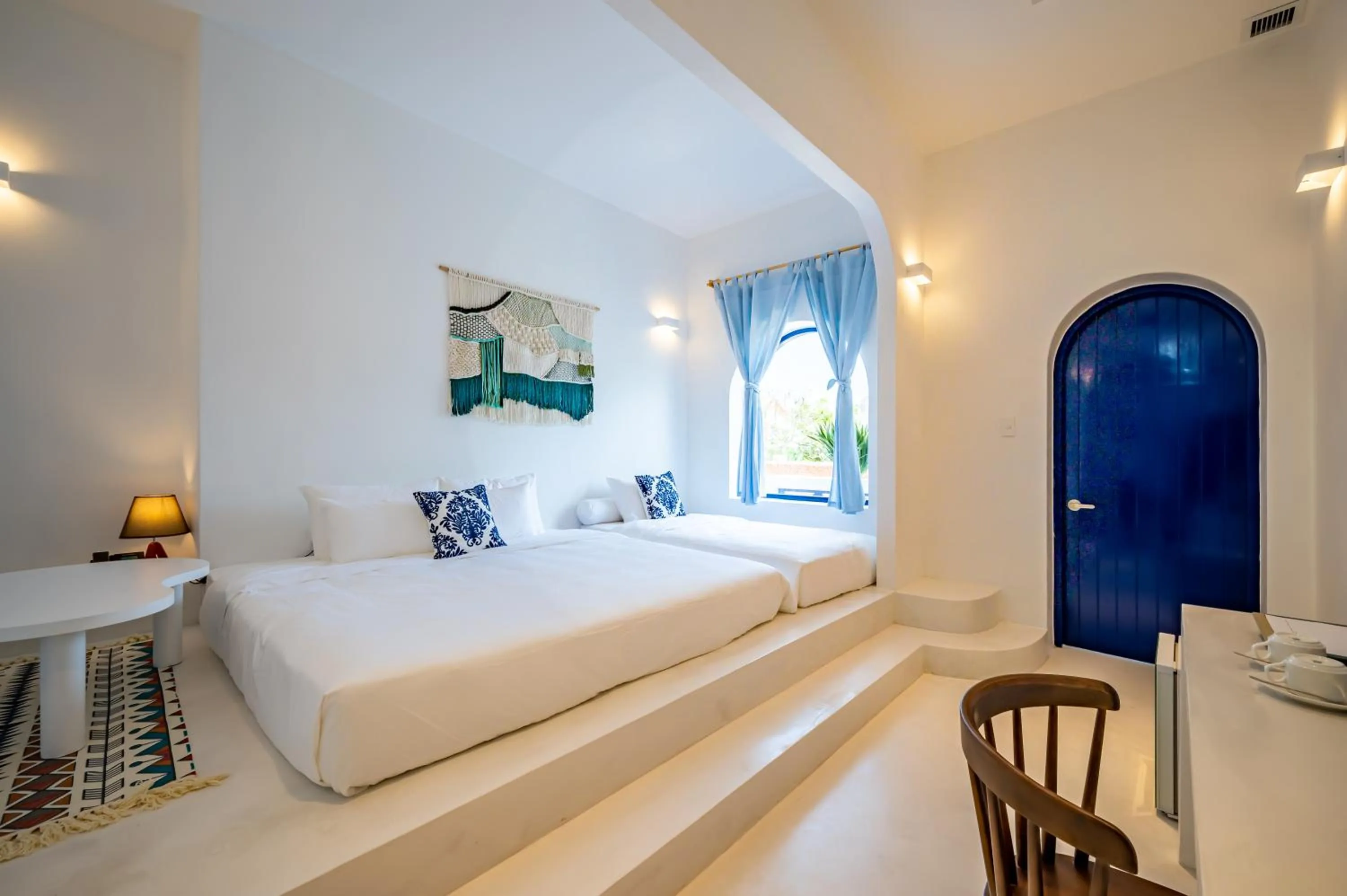 Living room, Bed in Happiness Hotel