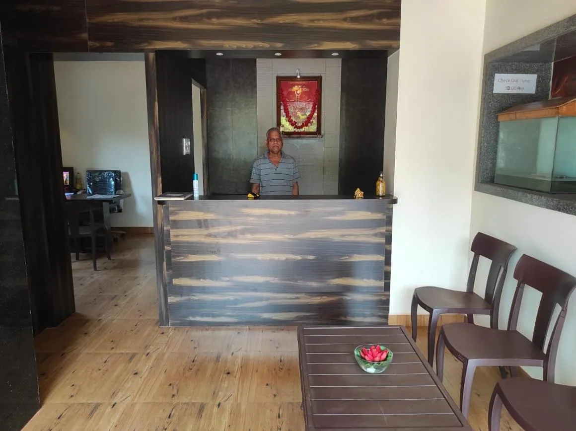 Living room in Hotel Deepak Executive, Ganpatipule