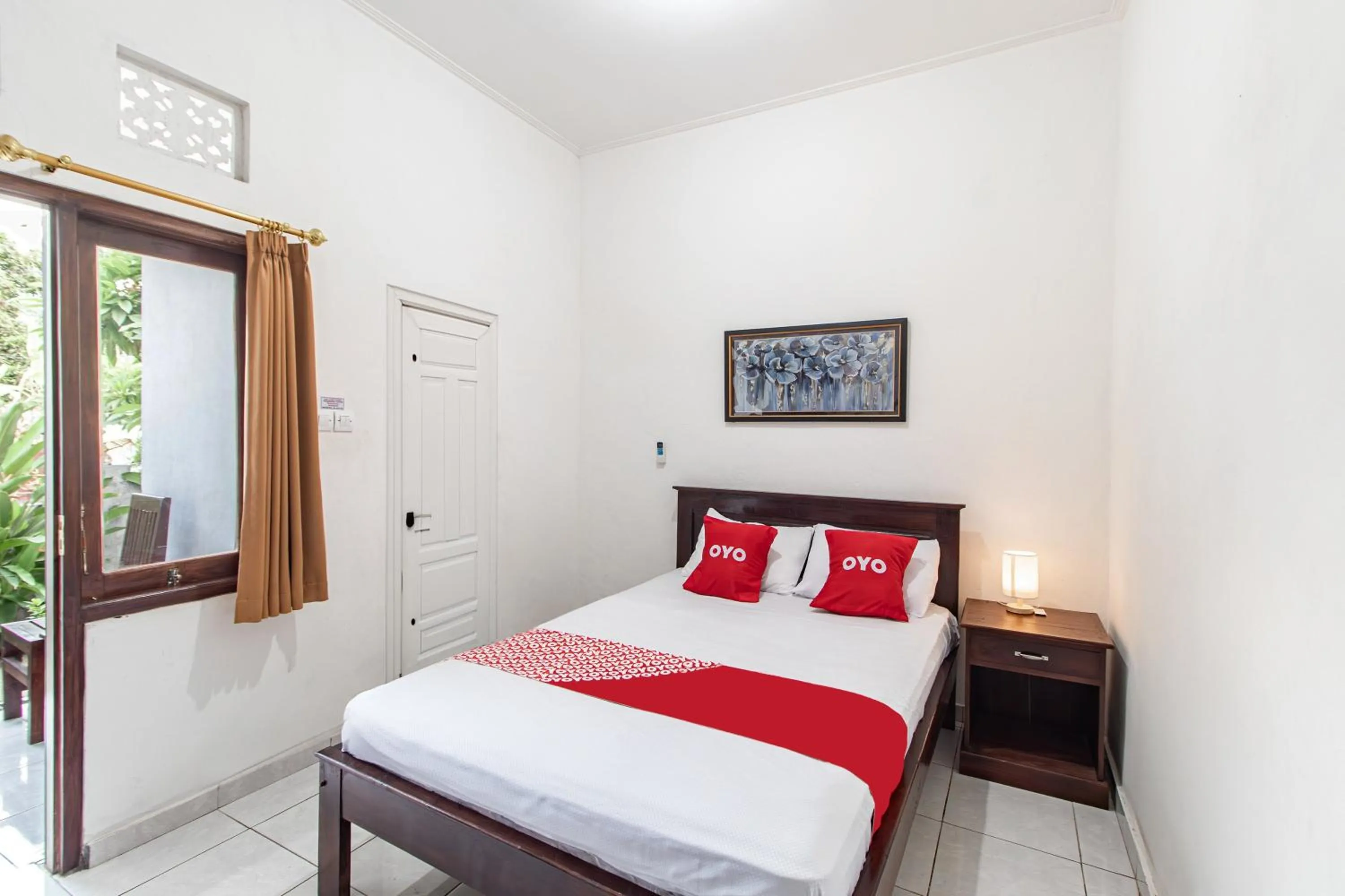 Bedroom in OYO 93482 Penginapan Tenang Lovina