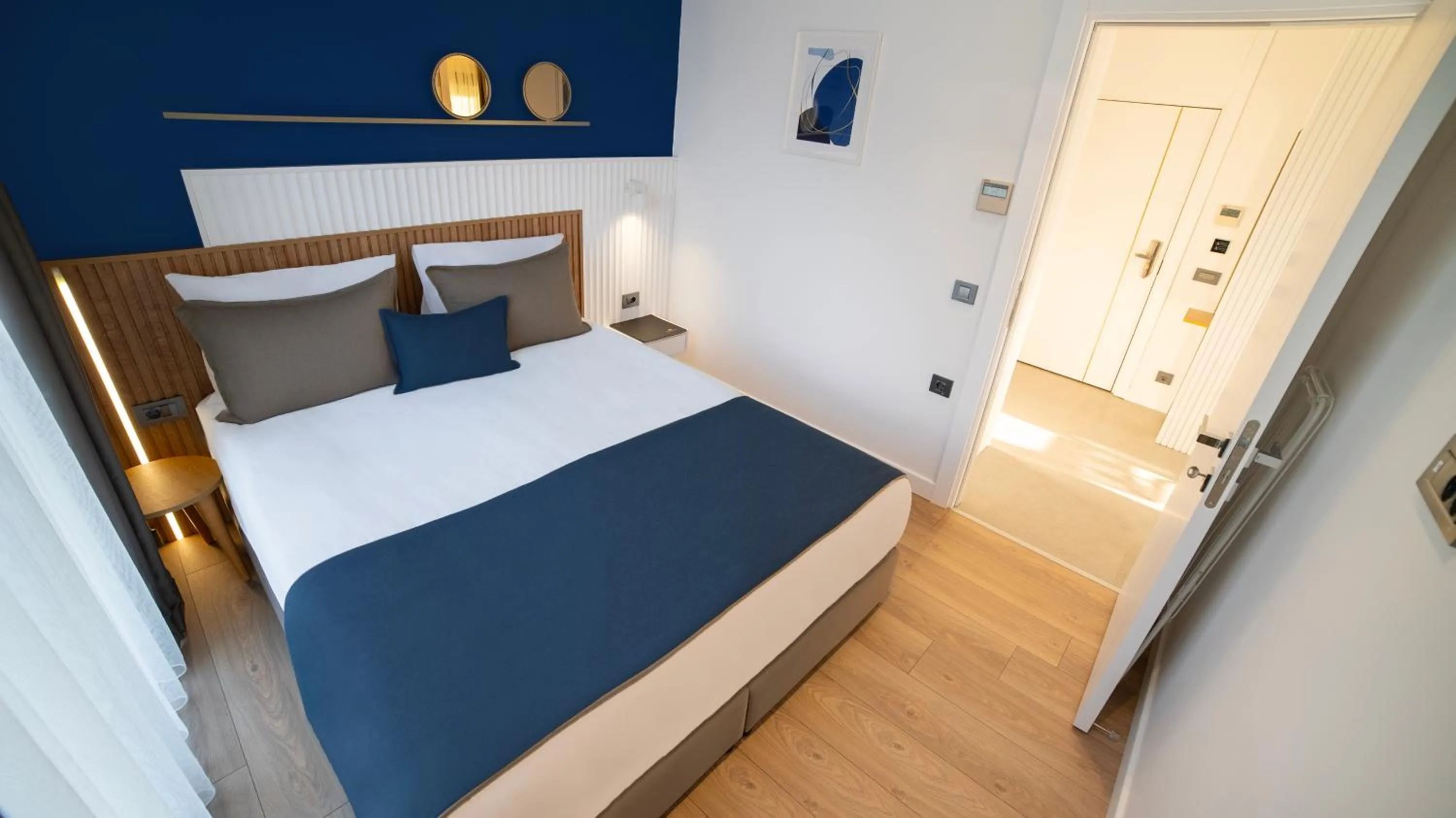 Bed in Stile Suite Marine Hotel