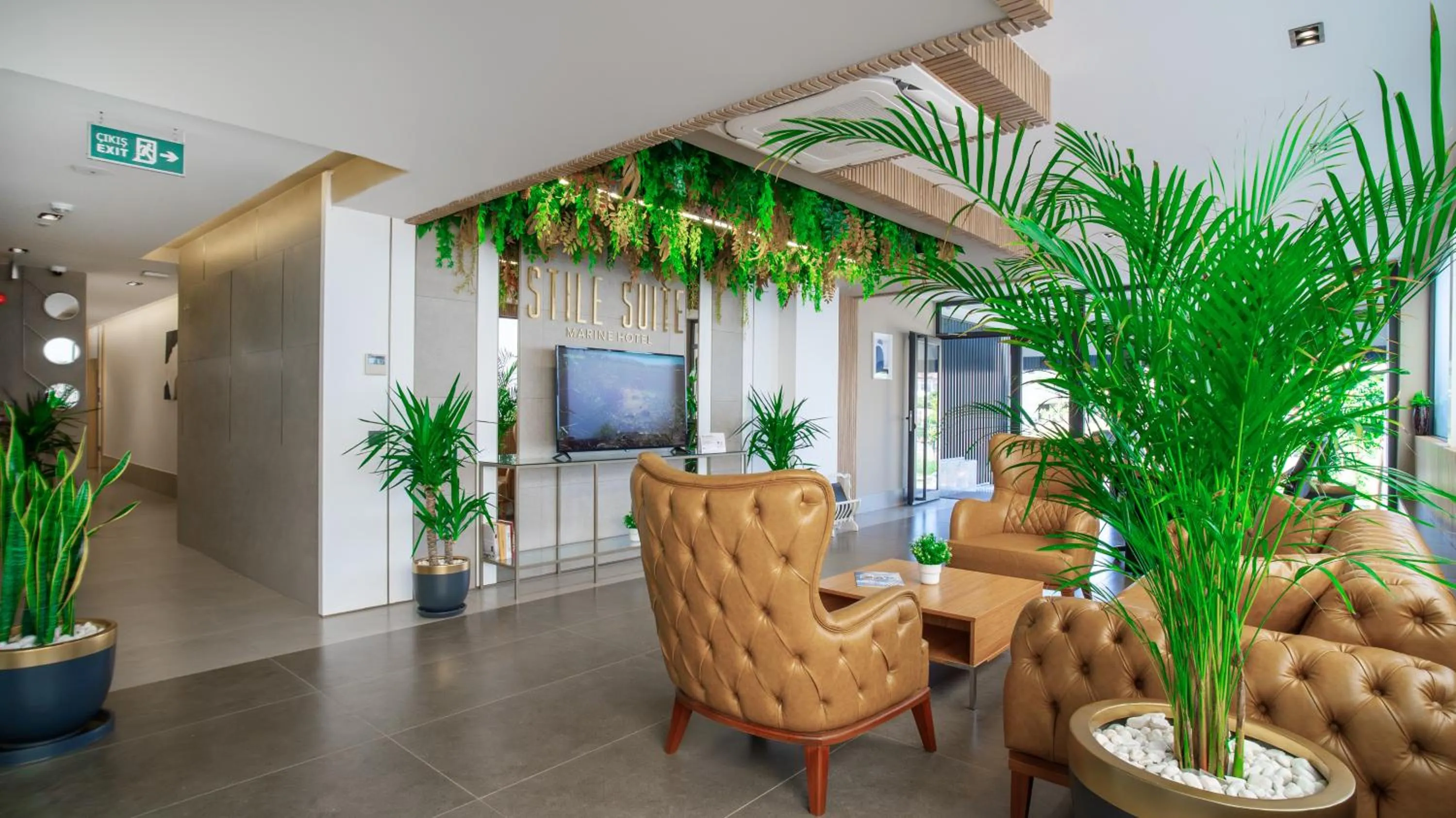 Lobby or reception in Stile Suite Marine Hotel