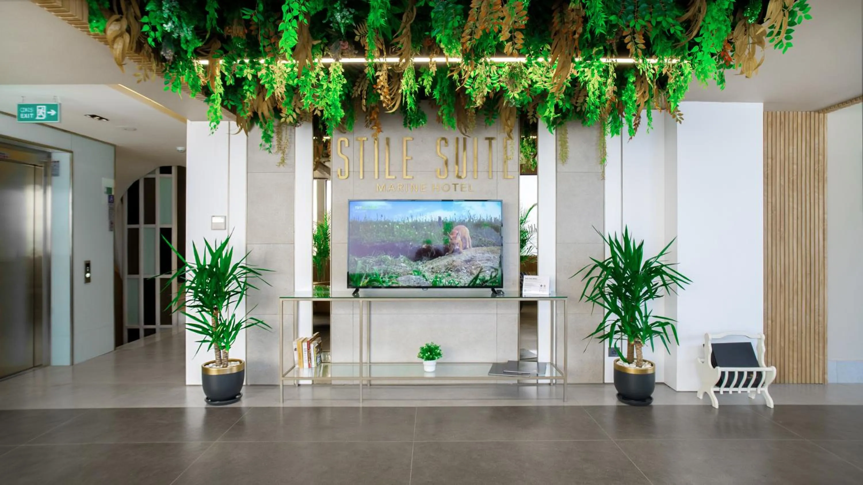 Lobby or reception in Stile Suite Marine Hotel