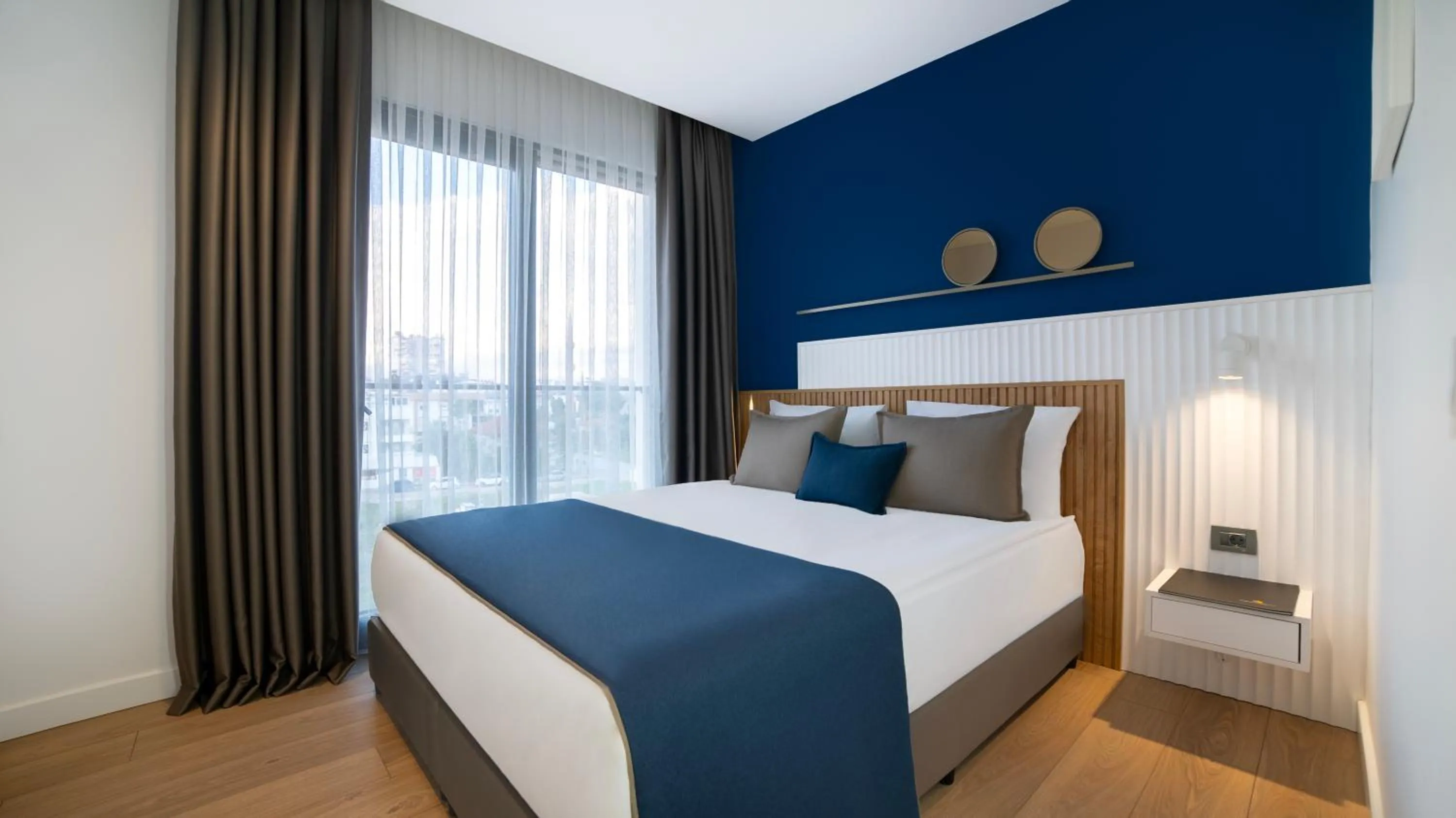 Bed in Stile Suite Marine Hotel