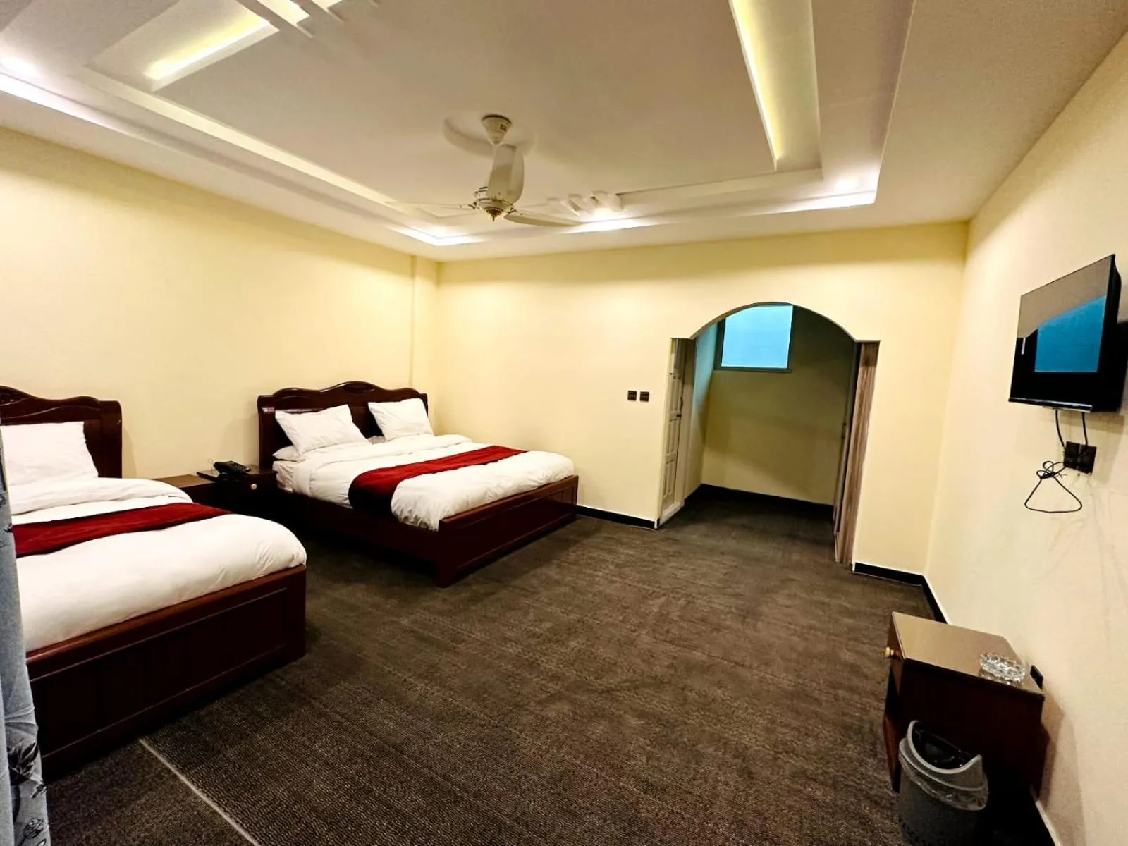 Communal lounge/ TV room, Bed in Desert One Hotel Skardu