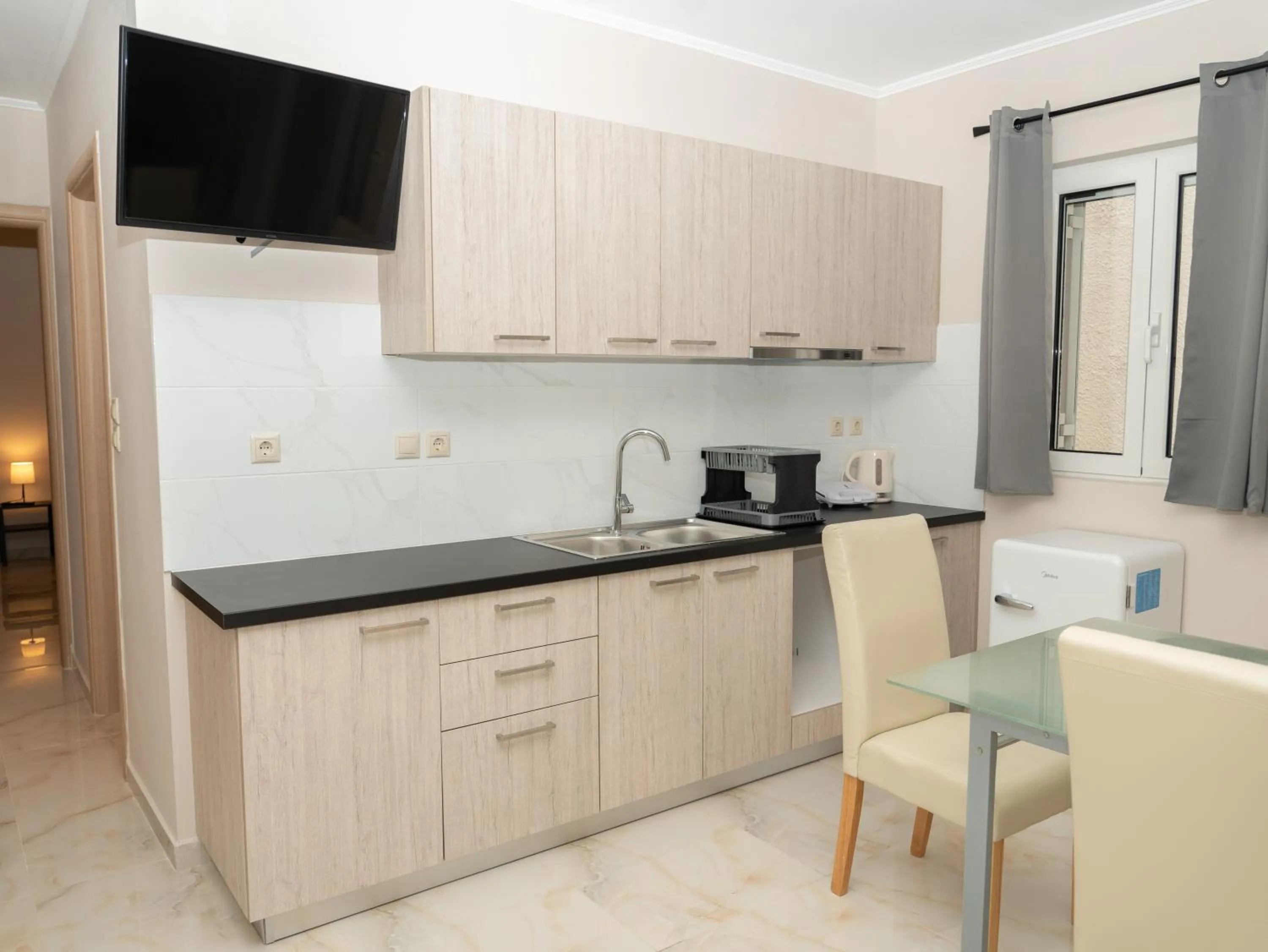 Kitchen or kitchenette in ALLAGIANNIS GROUP APARTMENTS