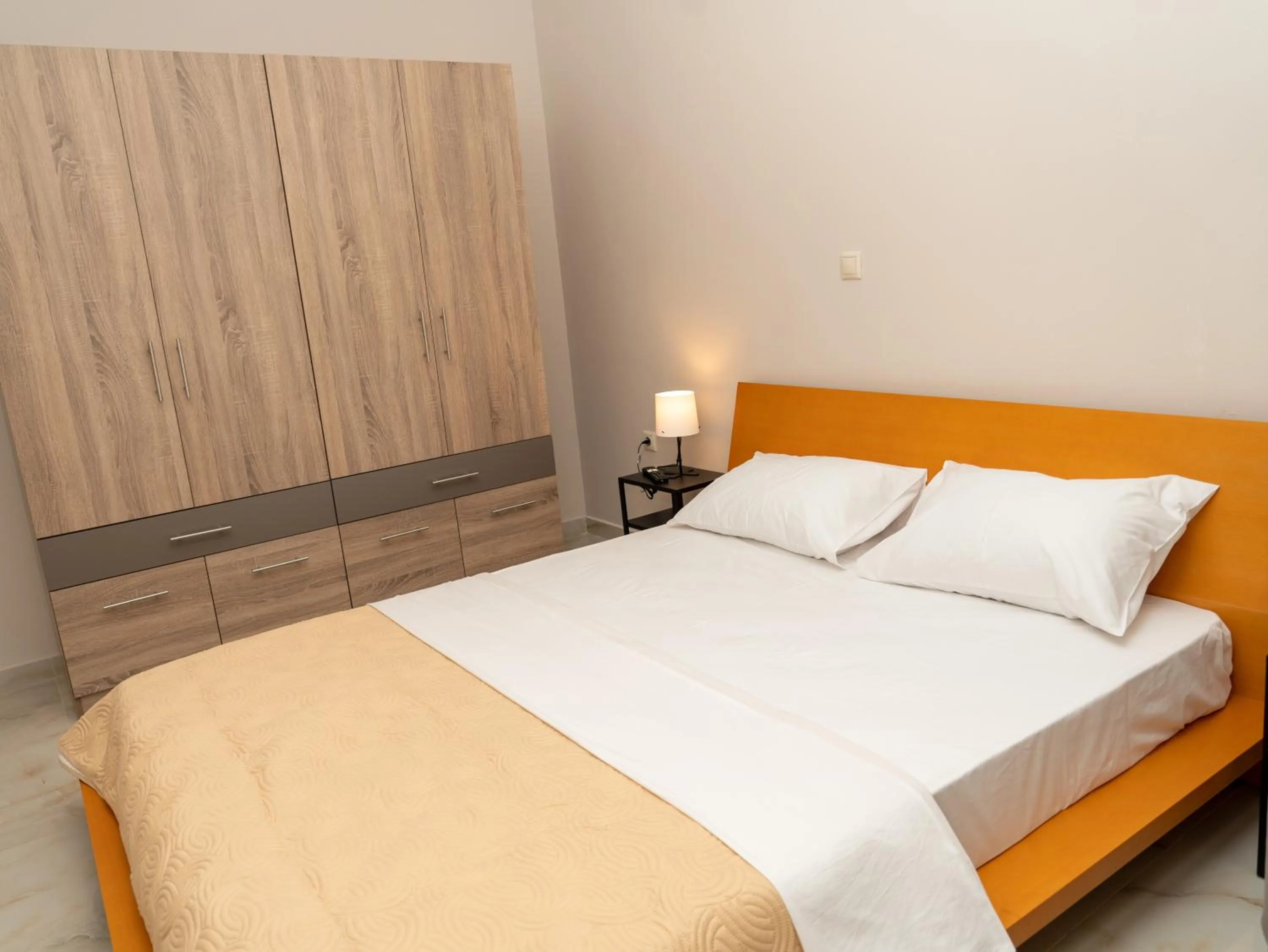 Bed in ALLAGIANNIS GROUP APARTMENTS