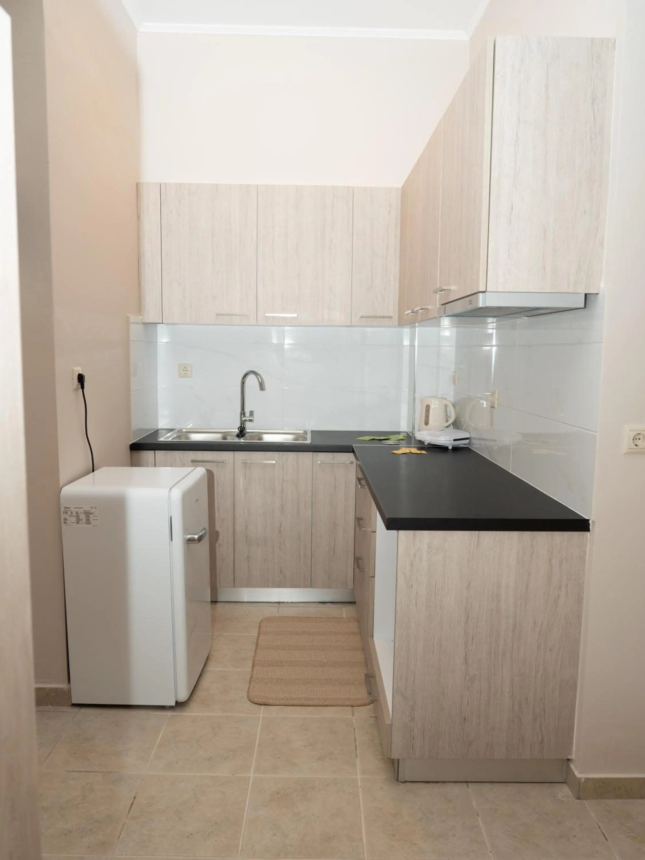 Kitchen or kitchenette in ALLAGIANNIS GROUP APARTMENTS