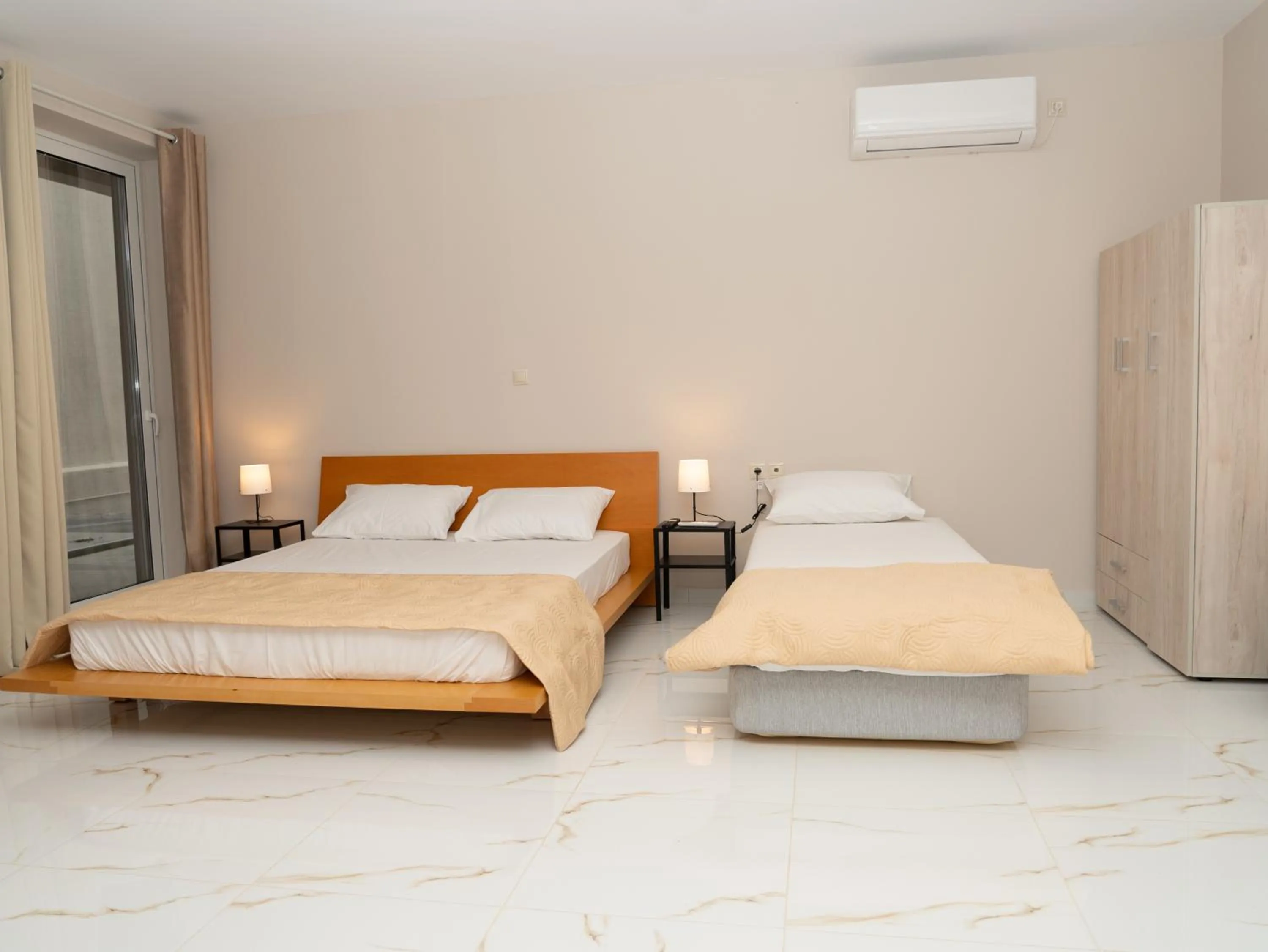 Bed in ALLAGIANNIS GROUP APARTMENTS