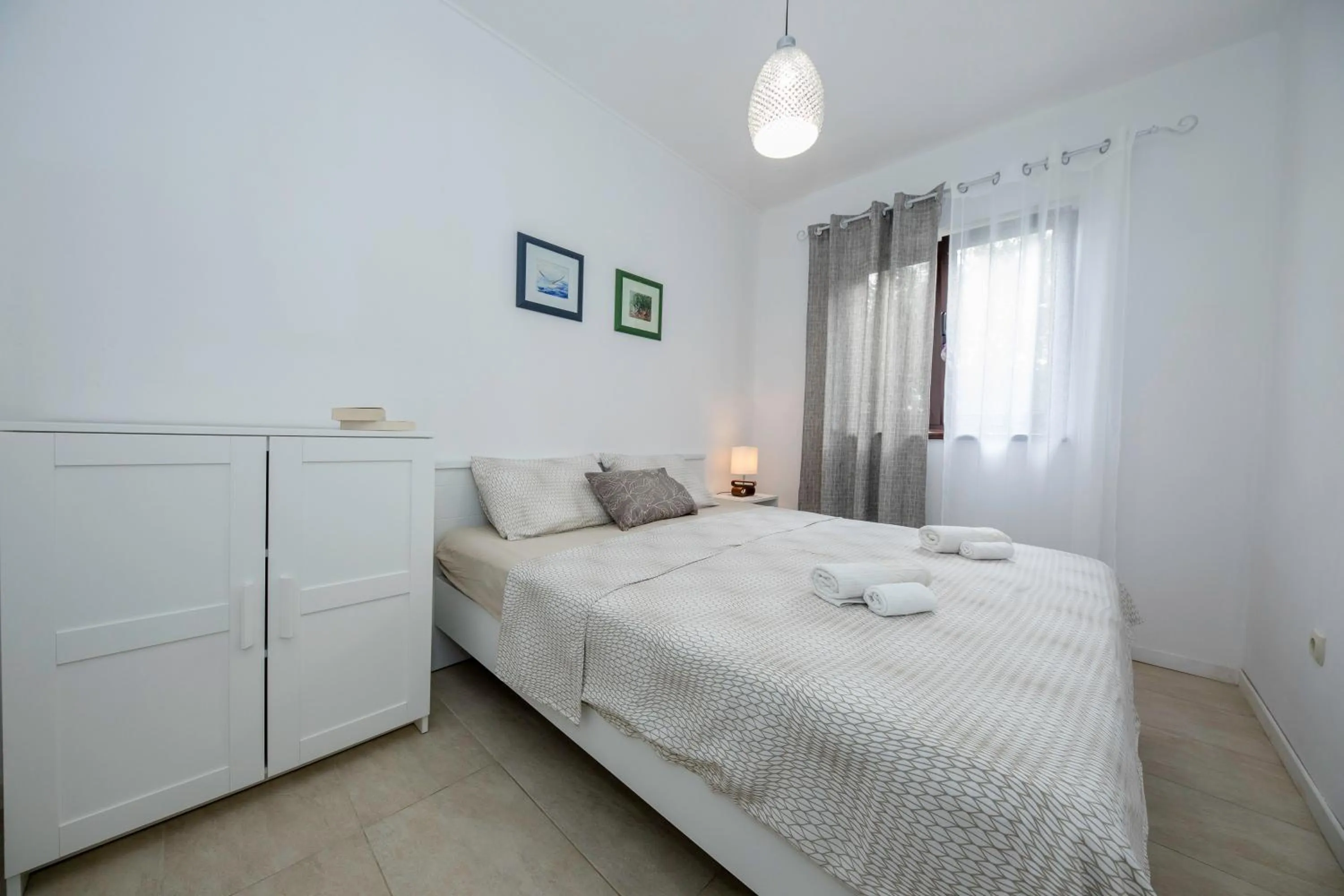 Bed in Miral Apartments